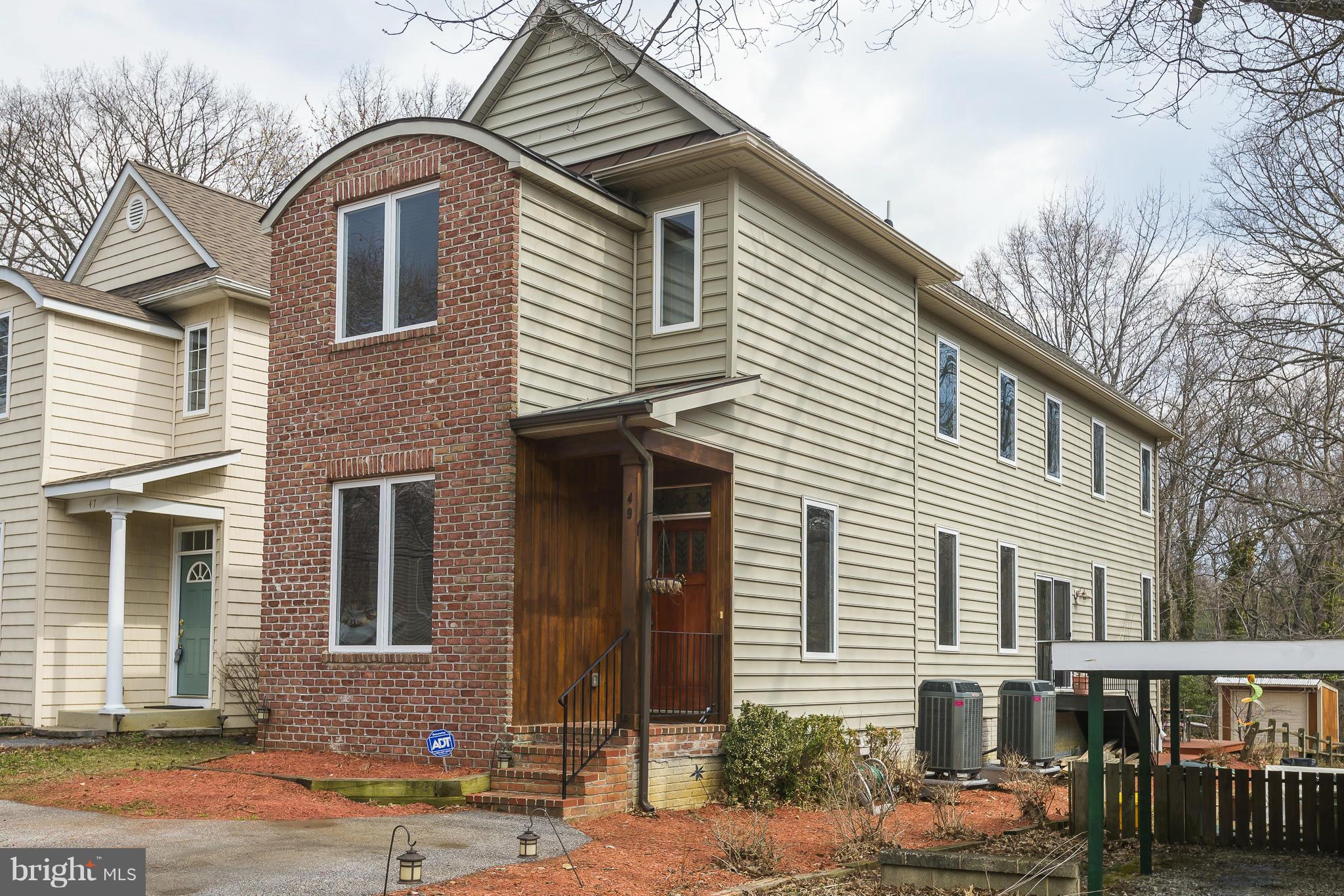 Great find just outside Downtown Annapolis.  This home looks brand new.  Gleaming hardwood floors, gourmet kitchen w/ quartz counter tops, stainless steal appliances, gas stove, built in sound system, sunken living room w/ gas fireplace, 2 zone heating/cooling, den/office on main level.  Master w/ vaulted ceilings, large walk in closet, super bath w/soaking tub & separate glass enclosed shower.