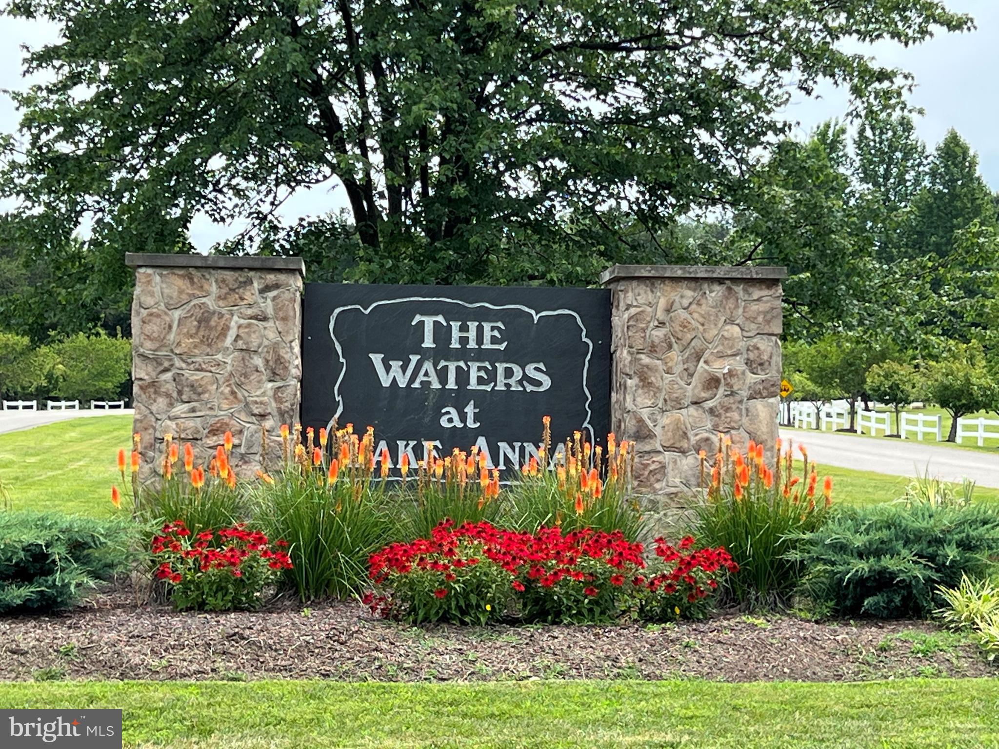 3 wooded private acres in the sought-after neighborhood, The Waters, on the private side of Lake Anna. The lot has a gentle slope up from the street, providing great street frontage, and then falls gently away towards the back of the lot, allowing for a walk-out basement if desired.  The Waters at Lake Anna offers a clubhouse, an in-ground pool, multiple common areas, a sandy beach, boat slips, a boat ramp, tennis courts, and a playground. The HOA board has 7 boat slips available for lease for $100.00 per month, and they can be leased monthly or on a 3-month basis. Day slips are also available for use.. The Waters is close to all the lakes' amenities, including wineries, breweries, restaurants, and a Food Lion.