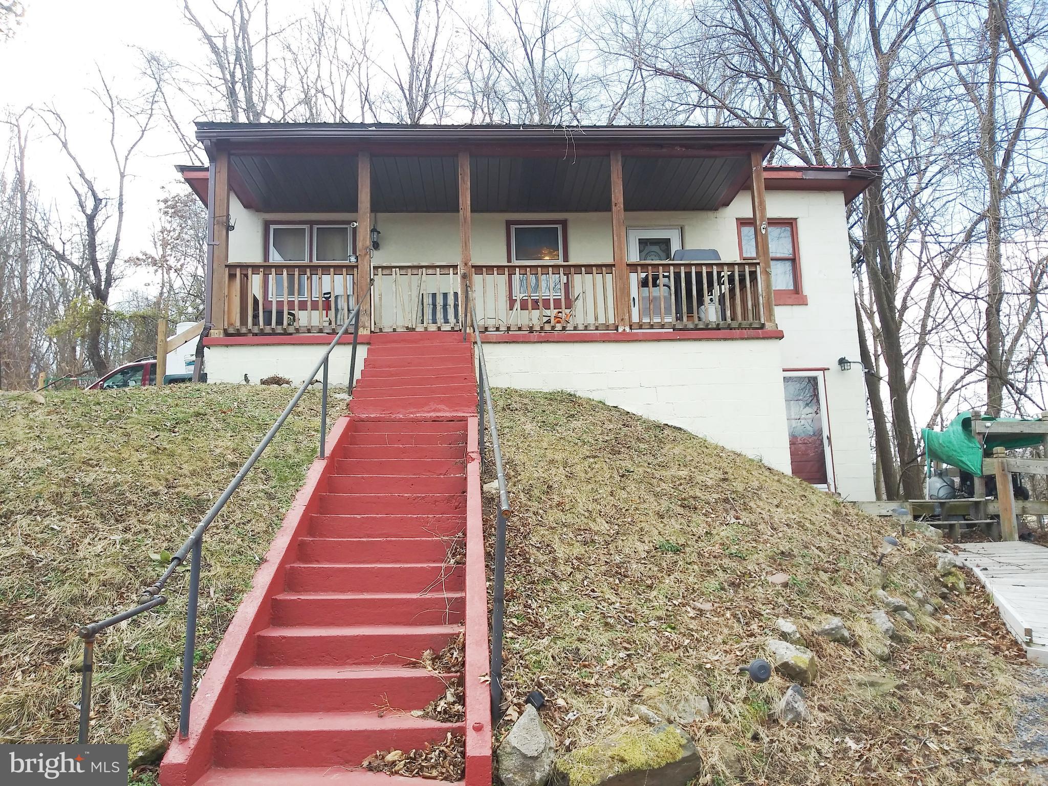 Cozy 2 Bedroom  Home  Featuring  Private Setting with incredible views and still close proximity to downtown Cumberland and I68. Generator back up. Parking for at least 4 cars.