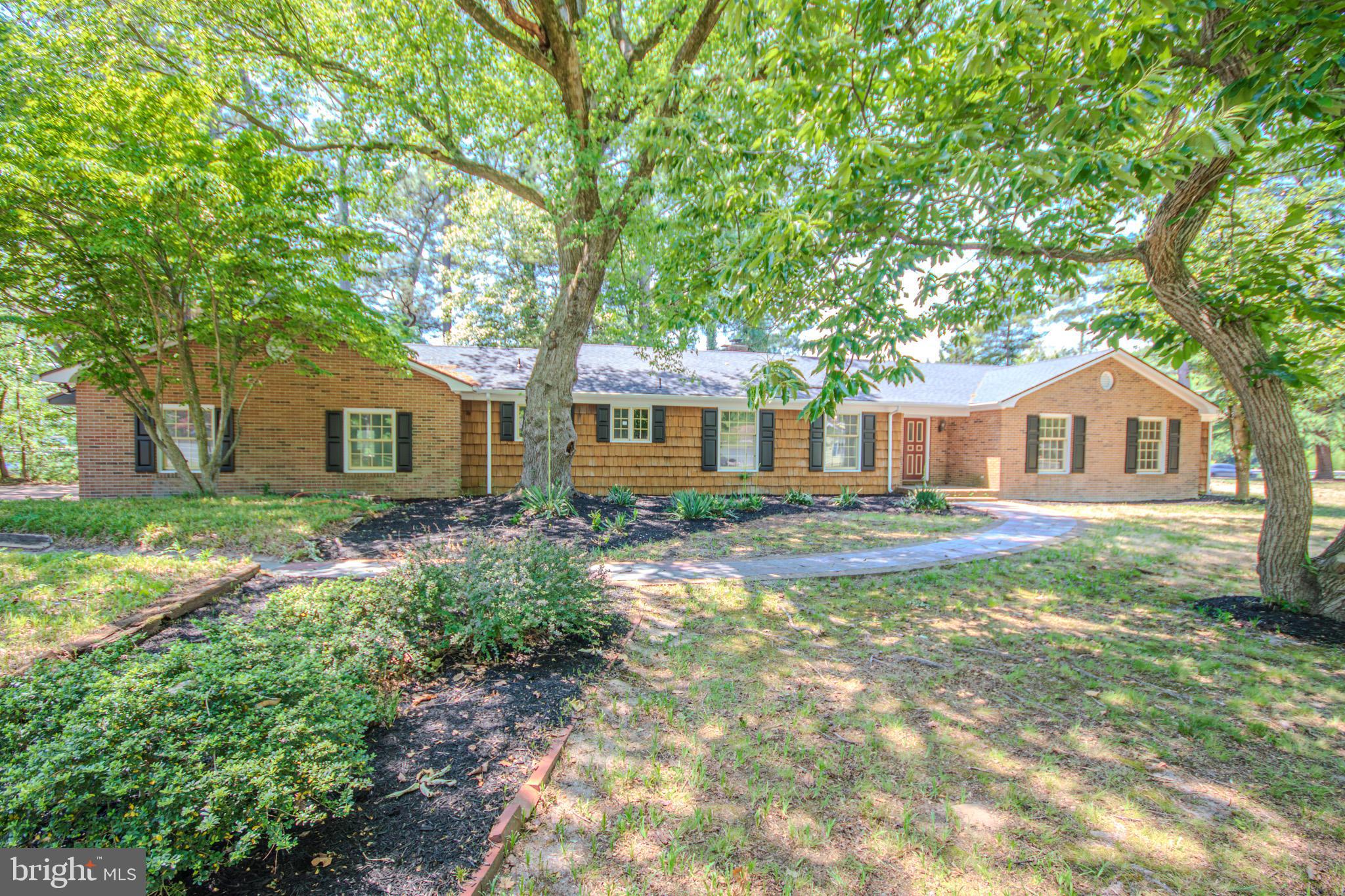 Beautifully updated waterfront-community rancher offering 3-4 bedrooms, 3 full baths, and one-level living in a highly desirable location between Salisbury, MD, and Delmar, DE. Nestled in an established neighborhood just off Route 13 North, this charming home combines modern updates, generous living spaces, and picturesque pond views.
Step inside to find all-new luxury vinyl plank flooring throughout and a beautifully renovated kitchen featuring new cabinetry, granite countertops, and new appliances. The spacious kitchen also offers ample room for a large dining area, making it the perfect gathering place for family meals and entertaining. Numerous recent improvements include a newer HVAC system, hot water heater, lighting fixtures, and select interior and exterior doors. The roof was replaced in 2025, providing added peace of mind.
Designed for both comfortable everyday living and entertaining, the home offers two expansive gathering rooms, each featuring its own fireplace, creating warm and inviting spaces for family and guests. The screened porch overlooks scenic Leonard Mill Pond, providing a peaceful retreat to enjoy morning coffee, evening sunsets, and tranquil water views.
Conveniently located near shopping, dining, healthcare, and all of North Salisbury's amenities, this property also offers quick access to Delaware's tax-free shopping. With its thoughtful updates, waterfront-community setting, spacious layout, and timeless charm, this move-in-ready home is a rare opportunity on Maryland's Eastern Shore.