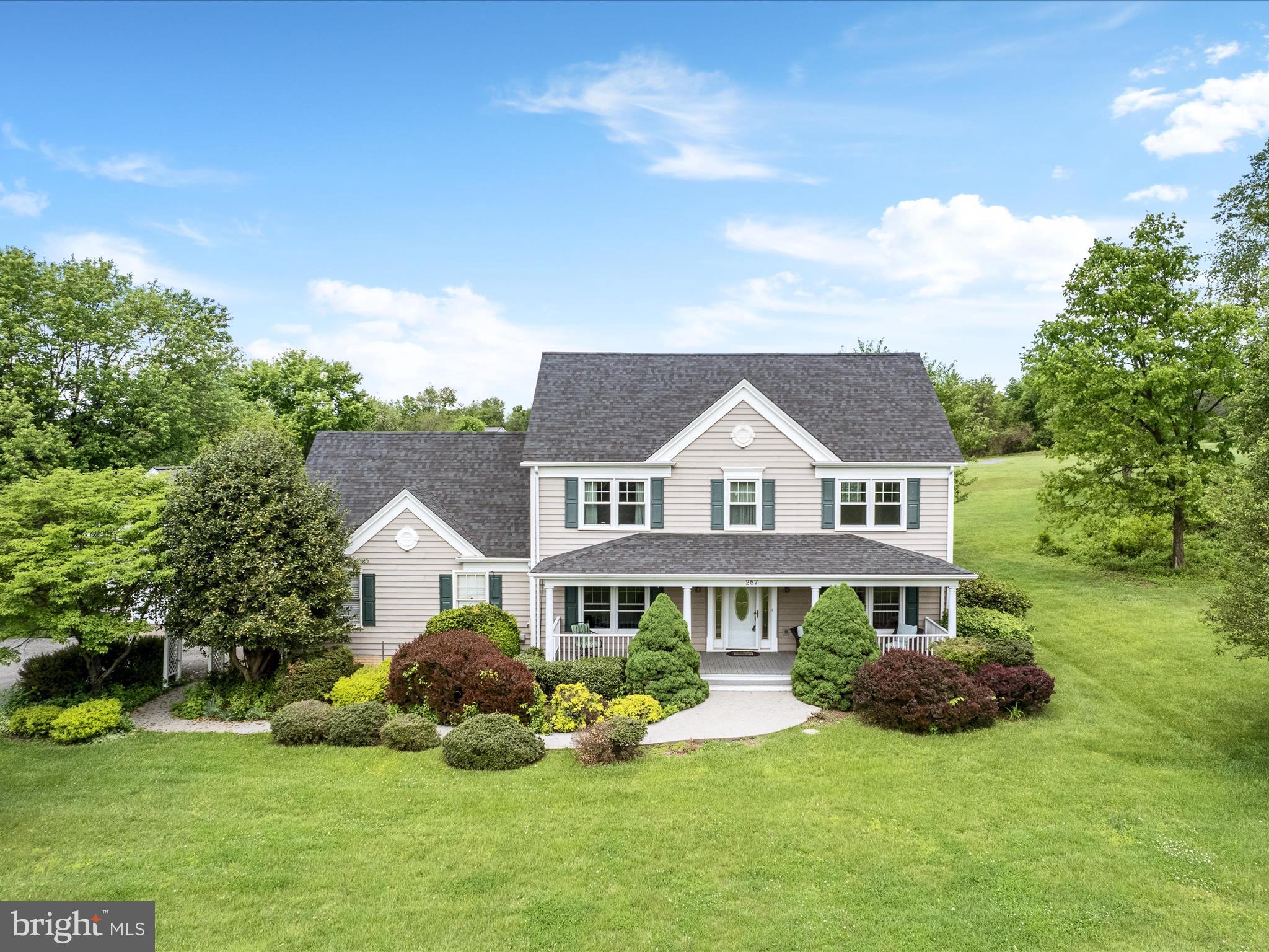 *Offer deadline Tuesday 5/13 at 12pm* Peaceful and pristine, this 2.69-acre property features a beautiful 4-bedroom home and detached 32x27 workshop  with upstairs work space. Get to the MARC train and commuter routes in minutes from this great location that’s close to historic Shepherdstown. Enjoy nearly 2,400 square feet of living space featuring mostly wood floors and a traditional, homey feel. The open-concept kitchen is equipped with a gas cooktop, island with seating, and convenient storage pantry. An eat-in area and formal dining room flank the kitchen, while the two living spaces flow seamlessly from the heart of the home. The primary suite upstairs features vaulted ceilings, a walk-in closet with custom shelving, and an ensuite bath with a gorgeous glass shower enclosure. Three other bedrooms, another full bath, and the laundry facilities round out the upper floor that looks down over the 2-story grand foyer.  Ample storage options and functionality are available in the 2-car attached garage and spacious detached garage/shed. A composite front porch and back deck - both with vinyl railings - provide ideal spots to relax and enjoy the picturesque setting surrounding this home. The newer roof, HVAC system, windows, and well pump provide peace of mind for years to come. This lovely residence may be everything you’ve been hoping for and more!