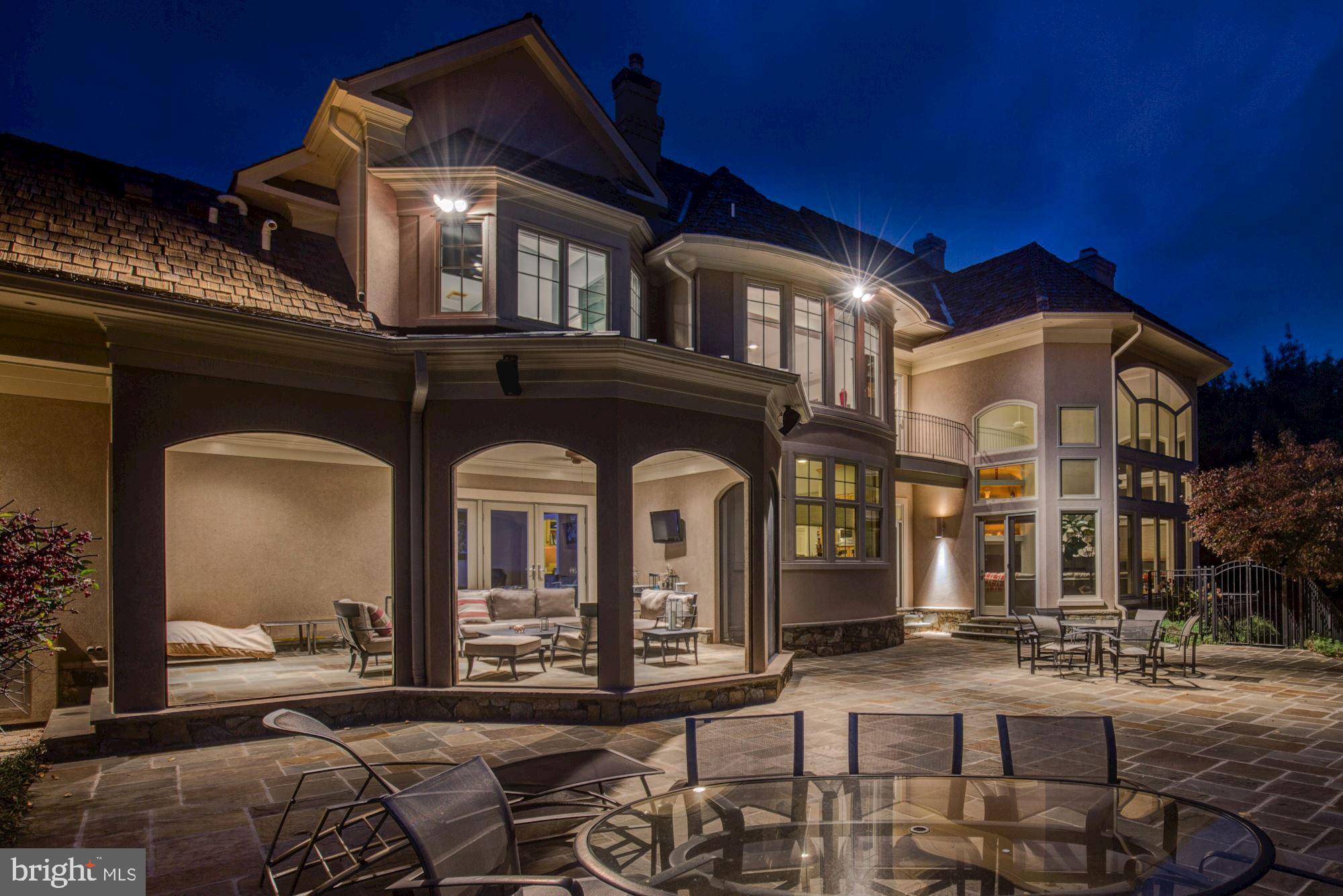 Beautiful custom home offering resort living in close-in Bethesda and Potomac. Just minutes to Congressional and Avenel Country Clubs in the gorgeous Avenel community. Set on a prime landscaped two-acre+ lot, the home combines contemporary and traditional elements in nicely proportioned, open rooms.Welcoming front yard and driveway, and backyard affording views from the house of the sprawling lawn, trees, large stone patio with barbecue, and swimming pool. Designed for the lot for the current owner. Carefully selected highest-quality construction, materials and fixtures. Recently expanded by the addition of a guest house joined to the main house by a covered walkway. The home has a total of 6 garage spaces, 6 bedrooms, 6.5 bathrooms and over 11,000 livable square feet in the main and guest houses. A Great Room with 2-story ceiling sits at the heart of the home. The fully finished walkout lower level provides entertaining and recreation space leading to the pool. The guest house is a full apartment above the 3-car garage, joined to the house by a covered porte cochere. Don't miss this amazing property!