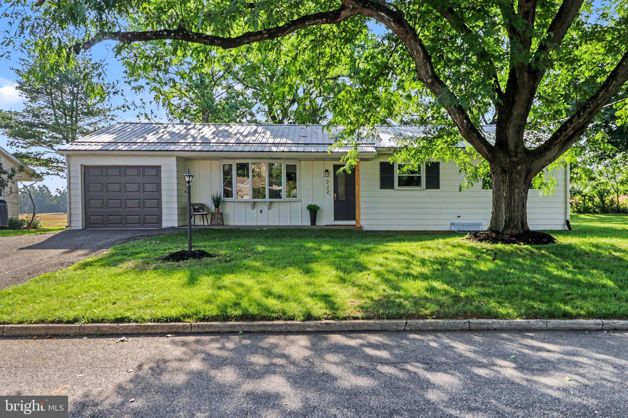 A true gem awaits in Derry Township! Nestled on a beautiful tree-shaded lot, this upgraded 3-bedroom beauty perfectly blends classic comfort with modern updates. Step inside to find warm, glowing hardwood floors flowing throughout most of the home. The inviting living room boasts a massive bow window that floods the space with natural light. Chefs will love the updated eat-in kitchen, featuring sleek quartz countertops, a new range and dishwasher, and new LVP flooring. Just off the kitchen, a convenient laundry room offers a deep sink and garage access.
The real showstopper is the rear Great Room—an amazing family room space surrounded by windows on three sides, overlooking a massive backyard that adjoins peaceful Milton Hershey School fields. Equipped with its own mini-split system for year-round comfort, this space is limited only by your imagination! The spacious master bedroom includes dual closets and a private half-bath, while two additional bedrooms feature large closets and replacement windows.
Downstairs, a massive poured-concrete basement offers endless potential for storage or future finishing. The property also includes an oversized 1-car garage with a storage closet.
Conveniently located minutes from Penn State Medical Center, major highways, downtown Hershey, Library, Airport, and much more. 
Schedule your showing today!
Please see our Virtual Tours & 3D Tour...just click on icon @ top of Listing Sheet under the address that says, "Virtual Tours".  Hopefully, you will enjoy them!!!