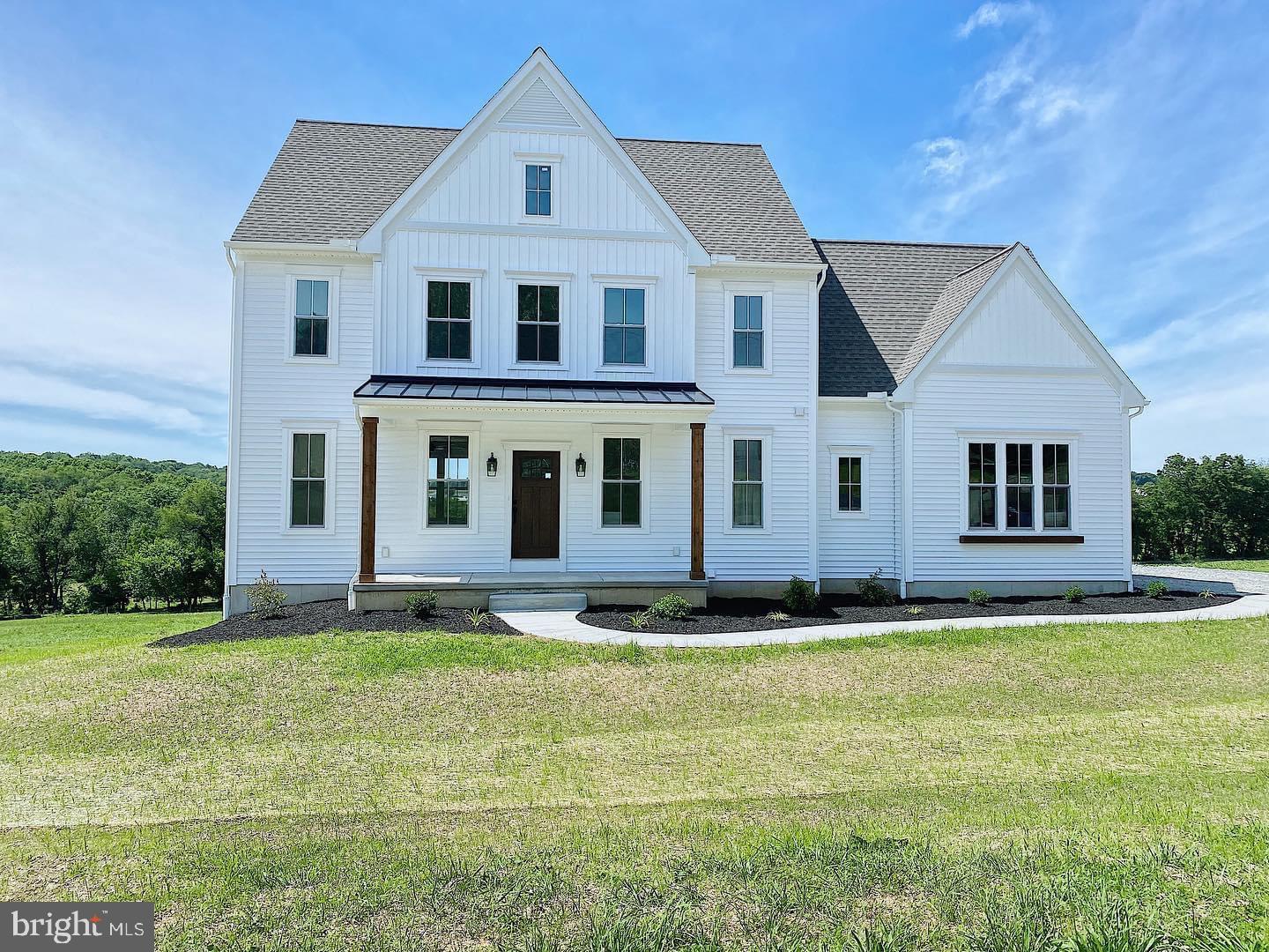 For Comp Purposes. Custom built Arlington Model by Custom Home Group. Offers 2100 sq ft, 3 Brs, 2.5 baths, and large bonus room over garage. Upgraded kitchen with large island, granite counters, cast iron farmhouse sink, decorative hood and extra cabinetry. 9ft first floor and basement walls.  Level 3 vinyl plank flooring on main level. Gas fireplace with slate surround in great room. Outside features a 19ft porch, board and batten siding, and a side load garage.