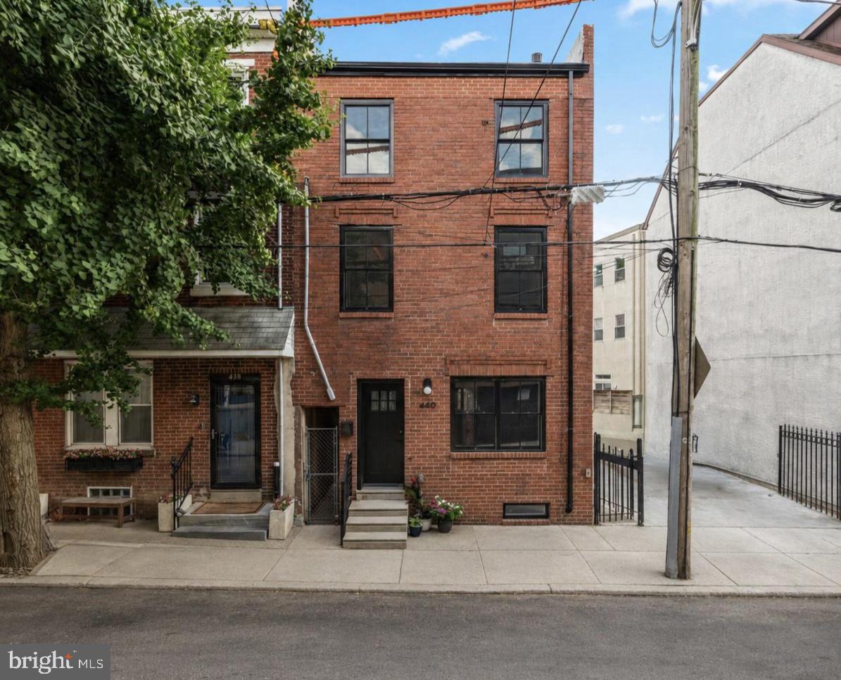 I know everyone thinks their home is special, but every once in a while, a home really does feel different. This recently renovated Northern Liberties rowhome is one of those rare finds, the kind of property that manages to feel both brand new and full of personality, polished but not sterile, thoughtfully designed but still warm and livable.

Behind its classic Philadelphia brick exterior is a home that has been rebuilt from the inside out. Everything within the walls has been newly and carefully considered, creating the feeling of a brand new house without compromising charm. This was not a surface-level renovation. It was a complete top-to-bottom transformation, professionally designed with premium materials, elevated finishes, and a level of attention that is immediately apparent the moment you walk in.

The main living spaces feel bright and easy to live in, with Coretec LVP flooring, top-of-the-line Pella windows, and spray foam insulation throughout, bringing both style and real function to the home. The renovation was designed not just to look beautiful, but to live beautifully, with new HVAC, upgraded electrical service, all new ducting, and the kind of behind-the-walls improvements that make a home feel comfortable, efficient, and solid for years to come.

The kitchen brings together clean modern design and playful, memorable detail. Bosch appliances provide the performance and reliability serious home cooks appreciate, while custom colorful ZIA tile adds a layer of character that keeps the space from feeling like every other renovated kitchen on the market. It is polished, practical, and genuinely pretty, a kitchen that feels as ready for a quiet weeknight dinner as it does for friends gathered around on a Saturday night.

What makes this home especially rare is the layout. With four proper bedrooms and two full bathrooms, including a true primary suite with its own en suite bathroom, the home offers a level of flexibility that is hard to find at this size and price point. Whether you need bedrooms, guest space, a home office, a nursery, or room to grow, this layout gives you options.

Out back, a large fenced yard adds another layer of everyday livability. It is the kind of outdoor space that changes how you use a home, perfect for summer dinners, raised planters, a dog, kids, morning coffee, or simply having a private place to breathe in the middle of the city. In a neighborhood where outdoor space is always appreciated and rarely taken for granted, this yard is a meaningful bonus.

Downstairs, the full basement offers real utility, with full size side-by-side laundry and plenty of space for storage - especially for the practical pieces of city living that never quite fit anywhere else.

And then there is the location. Set in the absolute heart of Northern Liberties, one of Philadelphia’s most established and consistently desirable neighborhoods, the home sits within easy reach of the places that make this area so beloved. Bardot Cafe is on your block and you're only a short stroll from the freshly renovated Liberty Lands Playground. Your go to's will quickly become Cafe La Maude and Menagerie Coffee all within a 5 minute walk...so many everyday conveniences are all close by. It is a neighborhood with energy, community, and a strong track record of appreciation, yet it still offers the kind of residential pockets that make it feel easy to settle in and stay awhile.

For added convenience, there may also be the possibility of a dedicated, leased, off-street parking space in the adjoining lot. Please inquire for details.

This is not just a renovated home. It is a carefully rebuilt space with warmth, function, and personality - ready to create memories in. It is the kind of home that feels considered from every angle, and that is exactly what makes it so special.
