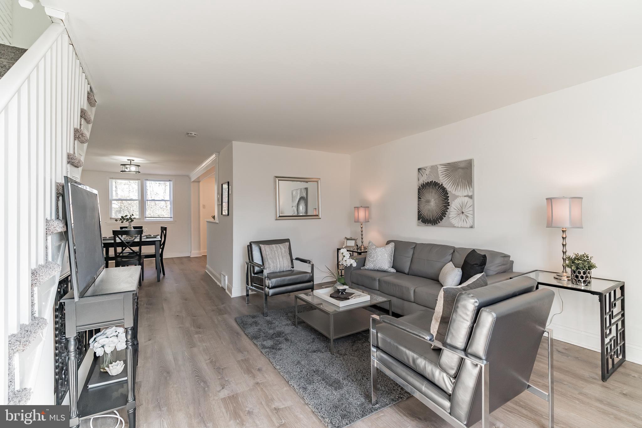 Welcome to 151 Golf Street, a beautifully remodeled home in the sought-after neighborhood of Devault. This stunning 3 bedroom, 1.5 bathroom home boasts a neutral color scheme throughout, allowing you to add your personal touch with ease. As you step inside, you'll immediately notice the abundance of natural light that floods the entire home, creating a warm and inviting atmosphere. The first floor has been completely transformed with brand new flooring and modern light fixtures, making it the perfect space for entertaining or relaxing. The large open living room is perfect for gathering with friends and family, while the separate dining area overlooks the beautiful kitchen. The kitchen features a striking tile backsplash, stainless steel appliances, white modern cabinets, and crisp hardware. You'll love preparing meals in this bright and spacious kitchen. Upstairs, you'll find three generously sized bedrooms and a full bathroom with a tile surround bathtub. The finished lower level has a convenient powder room and a bar, making it the perfect space for entertaining or a home office. The basement also offers plenty of storage and a wash sink in the laundry area. Outside, you'll find off-street parking, providing you with additional convenience. This home also qualifies for special programs and financing for qualified Buyers, including the Neighborhood Opportunity Program, a 3% down payment loan program with competitive mortgage rates that requires no additional private insurance plus an additional $25K in grants.