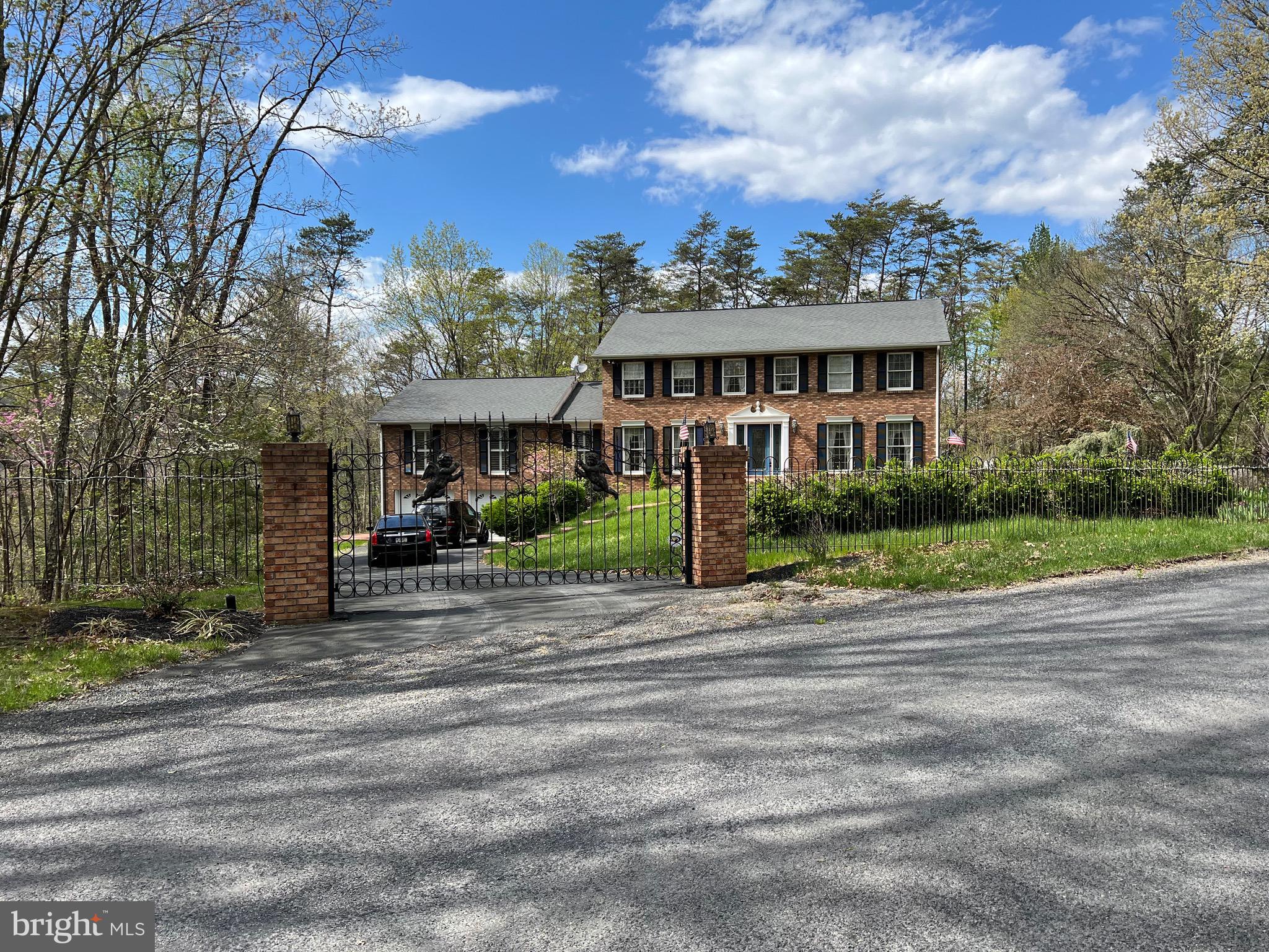 Check out this charming colonial style home, located outside of city limits! Plenty of parking in the driveway, or in the two car garage! On the inside you'll find plenty of spacious rooms, including a full living room, dining room, and study area! Very large open bonus room built above the garage, great for entertaining guest!
Around back you'll find an enclosed sun room ! Spacious rear yard! Don't miss this one ! Located outside of city limits so no city taxes!!!!! Downtown Cumberland is approximately a 15 minute drive, enjoy the quiet country side all while having easy access to the convenience of downtown !