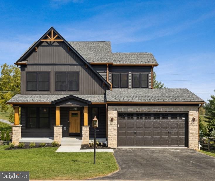 HOME TO BE BUILT. Build this beautiful, custom home, modify to suit your needs or build something completely different. Main floor 5th bedroom plan available. This home offers beautiful curb appeal with a nod to modern design elements. The dark slate exterior of the home is accentuated by copper-colored gutters, black windows, and cedar-covered wood grain exterior accents. Through the front door, the first floor includes a flex room with sliding barn doors, a powder room, and an open floor plan that includes a gourmet kitchen with upgraded cabinets, stainless steel appliances, quartz or granite counter tops and a huge island. Open plan to family room with vaulted ceilings and with wood burning or gas fireplace. Upstairs, the owners’ bedroom features a luxury ensuite bath with a tiled shower, double vanity, and walk-in closet. Three additional bedrooms, a full bath, and laundry complete the second floor living space. Superior construction with 2 x 6 walls, 35 year architectural shingles, electric car charger, tray ceiling, crown molding, extra trim detail, and much more. Pick your own finishes or modify plan to suite. You could even build a completely different model if you choose. Pictures are representative of model / finishes of home in this price range. Optional deck and screened porch and front exterior cedar work are an additional 35k.
