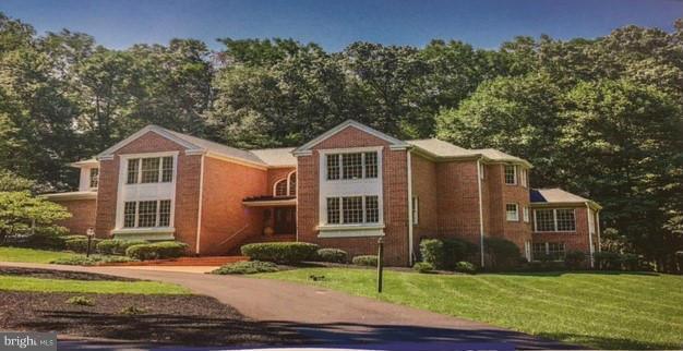 Price Repositioned for Astute Buyer! Custom estate home nestled on 9+A.;Main level Master ;Banquet Sized DR; 2 story foyer & Family Rm. w/cascade of windows; SPECTACULAR VIEWS; Sunroom; Screened porch; Deck, Patio; W/O lower level; Numerous recent updates- Gourmet kitchen, baths, driveway, roof, water heaters, HVAC + more ;Financial.disclosure & Lender Preapproval Required.