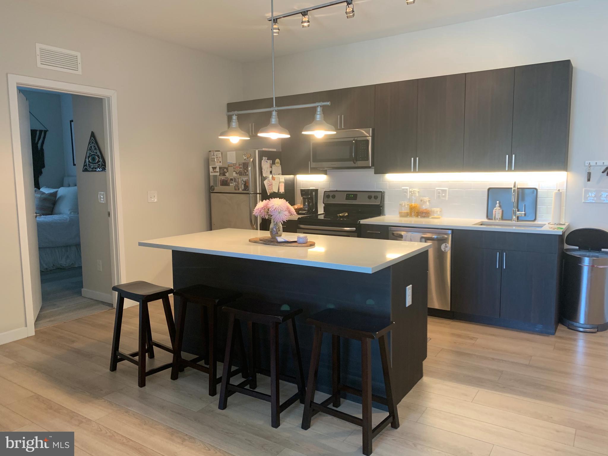 Price reflects 1 month free on a 13 month lease! Base price $1995. Spacious corner 2 bed, 1 bath in Northern Liberties and just steps from Fishtown! MOVE IN SPECIAL! Only 1st month's rent and HALF month's security deposit due at lease signing. This 4th floor apartment in newly constructed 18 W. Girard comes with washer dryer in unit, stainless steel appliances with large breakfast bar, hardwood floors, juliet balcony and an open floorplan with an elevator in the building, bike storage and pet friendly for $25/month and a one time non refundable $250 at signing! Come and check it out before it's gone!
