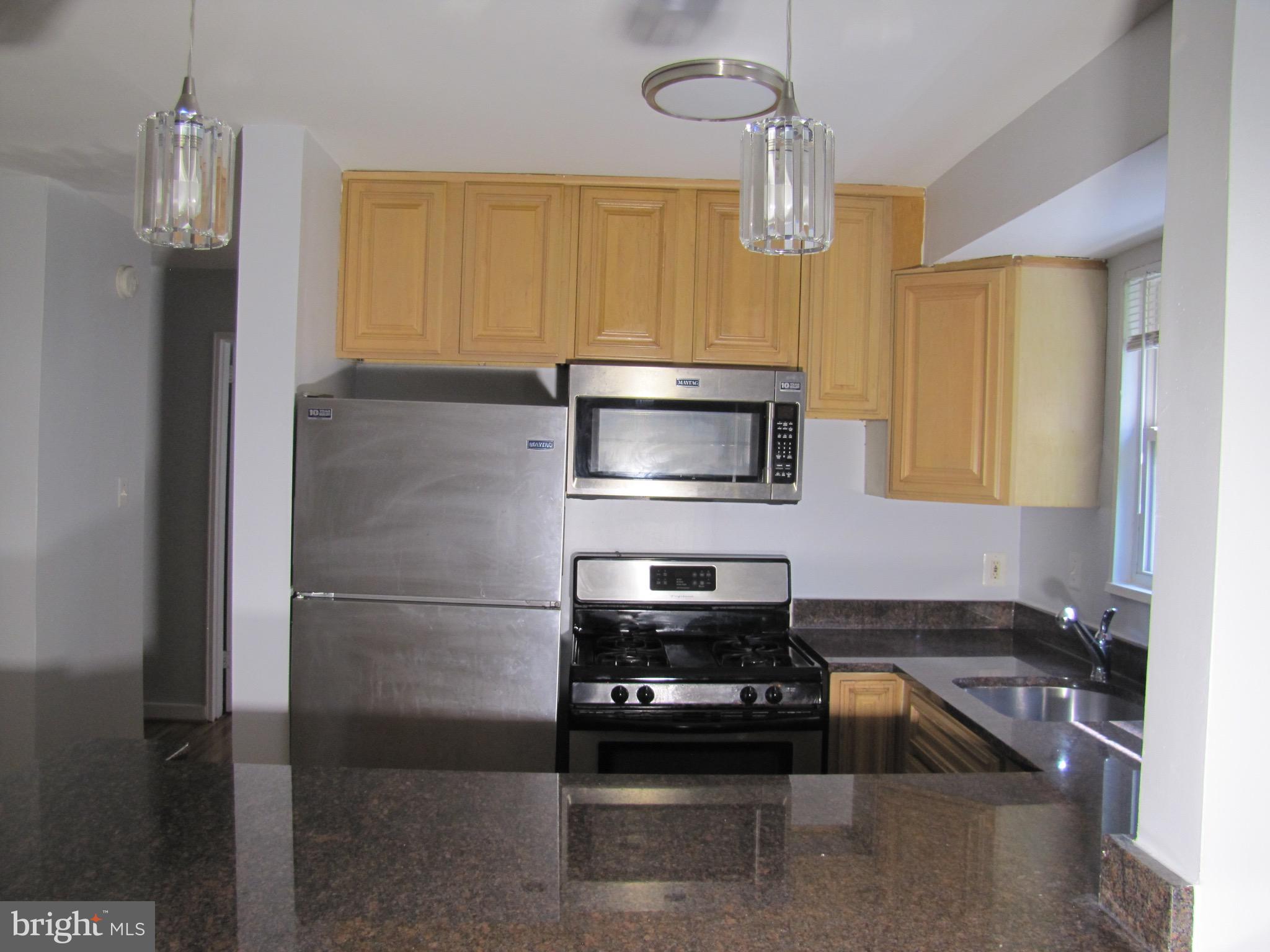 Very motivated seller ‼️ Discover this beautifully updated 2-bedroom, 1-bath condo offering 938 sq. ft. of sun-filled living space. The home features a fully renovated bathroom, fresh paint throughout, all-new lighting, and stylish waterproof laminate flooring. The open living and dining area is perfect for entertaining, while the modern kitchen boasts stainless steel appliances, granite countertops, and ample storage. Additional conveniences include reserved parking, an elevator, and an easily accessible laundry room. Set in a well-maintained, pet-friendly building, this condo blends a charming retro aesthetic with modern comforts. Its unbeatable location offers easy access to Takoma Park Metro Station, a bus stop just a block away, and major commuter routes. Enjoy being minutes from Takoma Park’s vibrant downtown—filled with shops, restaurants, parks, and a lively farmers market. seller is very motivated. Present all offer and will be considered.