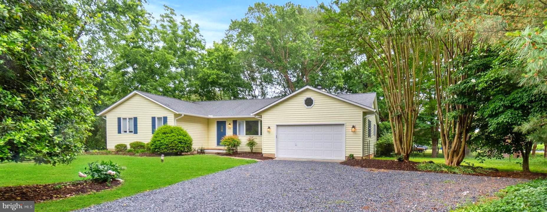 Live the Annapolis dream in this beautiful, well maintained, quality home surrounded with professional landscaping. Fantastic location on private lane with water privileges at the end of Lake Ogleton. This home delivers the ultimate move in ready experience with lots of “New”.  New roof, skylight and gutters in 2026, New heat pump in 2026 (with 10-year parts and labor warranty that transfers), New hot water heater 2026, New carpet 2026, New sliding glass door to screened in porch 2026, New outside steps to basement 2026, Freshly painted 2026 and more.  Beautifully updated large kitchen with vaulted ceiling, new skylight has an automatic remote shade, new window 2026 over sink and newer stainless-steel appliances, attractive tile backsplash and quartz countertops with a generous breakfast/lunch bar opening to a warm, inviting family room, complete with a charming wood burning fireplace.  From the family room, slide open the new glass door and step into the expansive screened in porch — perfect for morning coffee, relaxed evenings, Maryland crab feasts and entertaining.  Enjoy the elegance of the prefinished wood laminate floors.  Lovely separate dining room with vaulted ceiling.  Large living room with vaulted ceiling could also easily serve as a bonus room, office or playroom. Bedrooms feature brand new carpet.  Updated full hall bathroom includes a granite vanity counter and a large walk-in shower.  Master bathroom has designer tile backsplash in tub/shower area with a large built-in shelf.  Double sink marble vanity counter with designer tile border above it.  Attractive ceiling fans with lights. Basement has great potential to finish into a recreation room. Hague Water softener system is owned. House is well insulated. Attic blown in insulation. Garage with remote openers offers convenience.  Large driveway with ample parking. Public water and sewer hookup available.  Situated minutes from everything Annapolis is celebrated for - boutique shopping, restaurants, waterfront dining, historic downtown, theater, US Naval Academy, marinas, vibrant social activities, medical facilities, schools and more.  Ideal for commuters to Washington DC, Baltimore, Fort Meade, Bay Bridge and beyond. This home checks every box. This is the Annapolis lifestyle at its best — beautifully updated, move in ready, and perfectly situated