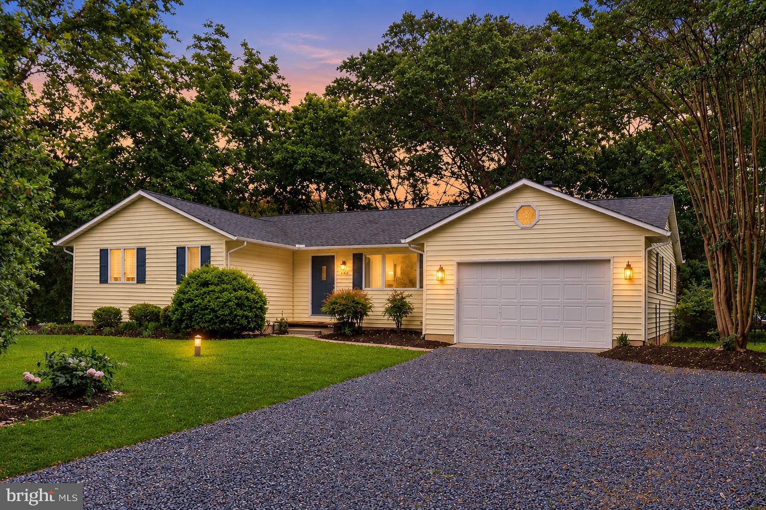 This exceptional Annapolis home truly has it all. Beautifully maintained, move-in ready home on a private lane. Updated with features that include a new roof, skylight, gutters, heat pump, hot water heater, carpet, sliding glass door, basement outdoor steps, fresh paint and more. The spacious kitchen’s vaulted ceiling has a skylight with a remote-controlled shade, beautiful quartz countertops, tile backsplash, breakfast bar, stainless steel appliances and opens to the family room with a wood-burning fireplace. The expansive screened porch is perfect for morning coffee, relaxing and entertaining.  Elegant wood style flooring enhances the main living areas including a separate dining room and a large living room. Bathrooms have been tastefully updated. The unfinished basement with DryLok painted walls offers excellent potential for future living space.  Well insulated, water softener system owned, very spacious garage with a large driveway. Water privileges at end of Lake Ogleton.  Just a few minutes’ walk to Peninsula Park to enjoy Pickleball, Tennis, Trails, Picnic areas, Playground, Baseball, Basketball and a multi-purpose field. Ideally located just minutes from Historic Downtown Annapolis, dining, shopping, marinas, medical, the U.S. Naval Academy, schools and major commuter routes to Washington DC, Baltimore, Fort Meade and the Eastern Shore.  SCHEDULE your showing today!