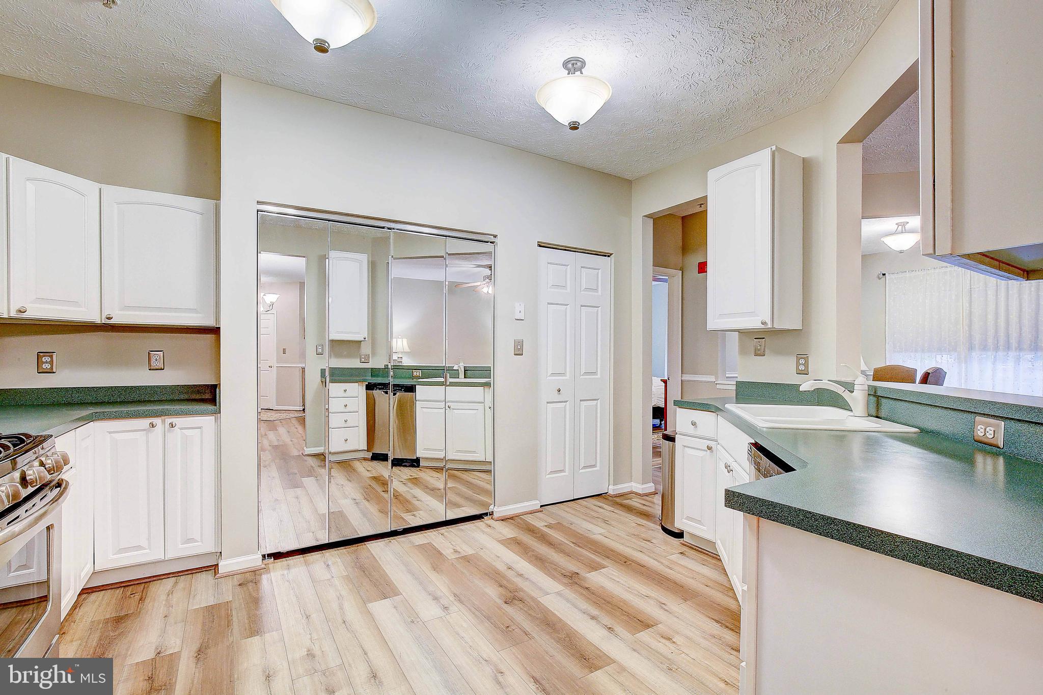 Welcome home to this rarely available ground floor unit in sought after Piney Orchard with a gas fireplace! 2-bedroom, 2-bathroom first floor condo with a walk-out patio level condo. Well laid out spacious bedrooms and bathrooms with a ton of light, its own private entrance and an office nook space. It has been well maintained by the owner with fresh paint, updated flooring and appliances. New HVAC in 2020 and new HWH in 2021! There is a pool, bike trail, tennis courts, community center, playground, jog/walk path, gym, water/lake privilege and recreation center on the premises that is covered by the condo fee. Located near Waugh Chapel, all your shopping needs are close by. Easy access to BWI airport and the MARC train station, Rt 100, Rt 32, Rt 175, I-97 and I-695. Centrally located between Washington DC and Baltimore. Surrounded by nature’s beauty, including lakes, a river and acres of protected land, the community has something to offer everyone. Right in the neighborhood is the Marketplace, playgrounds, GORC Park with athletic fields, the WB&A trail and miles of other walking trails. Rare opportunity so come and get it while you can.