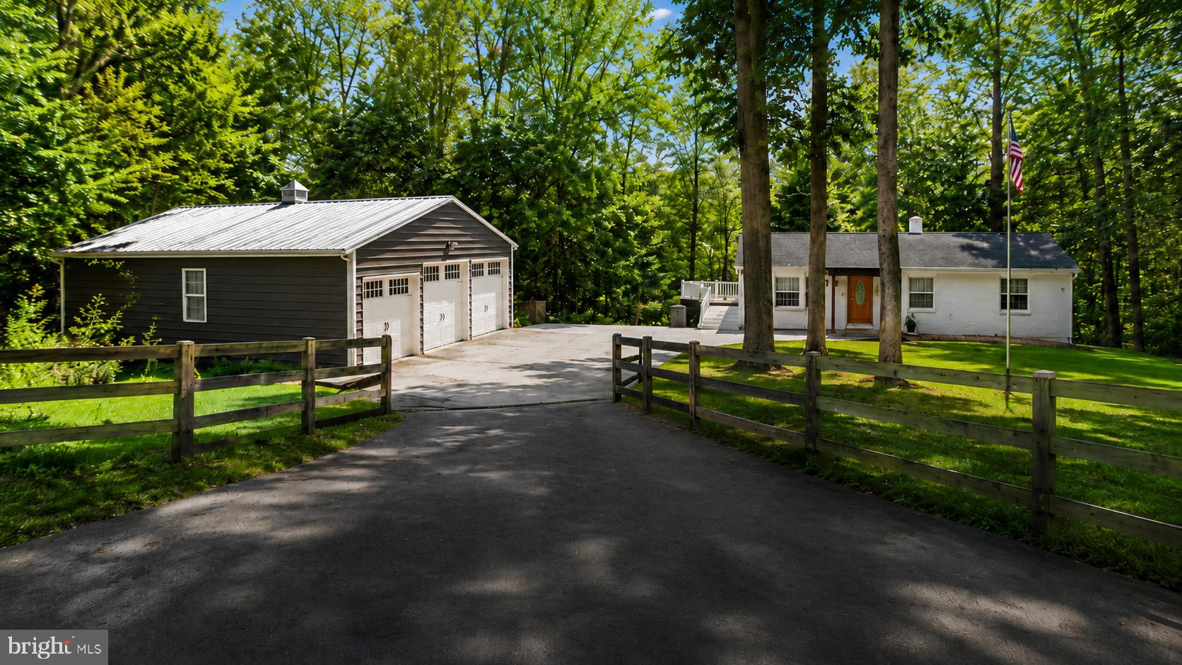 Enjoy a private and scenic setting in Rising Sun, Cecil County, just seconds from the beautiful Susquehanna River, where nearby fishing, canoeing, and outdoor recreation can be enjoyed. Perched above and overlooking Octoraro Creek, this updated 4-bedroom, 2-bath rancher offers peaceful views, mature surroundings, and plenty of natural scenery.

Inside, the home features a comfortable layout with 3 bedrooms and 1 full bath on the main level, plus an additional bedroom and full bath on the lower level — ideal for guests, extended family, a home office, or flexible living space. The home has seen several major updates, including a renovated kitchen in 2019, renovated main-level bath in 2021, new windows, and a brand-new roof in 2025.

The property also includes a whole-house generator with owned propane tanks, a whole-house fan, alarm system, and an impressive detached garage built in 2018. The 3-car garage offers space to hold up to 6 vehicles — perfect for car enthusiasts, storage, hobbies, equipment, or workshop space.

Step outside and enjoy the quiet surroundings, mature trees, creek overlook, and the natural beauty that makes this property feel like a private retreat. The community also offers access to a lake, adding another great outdoor feature to this peaceful Cecil County setting.