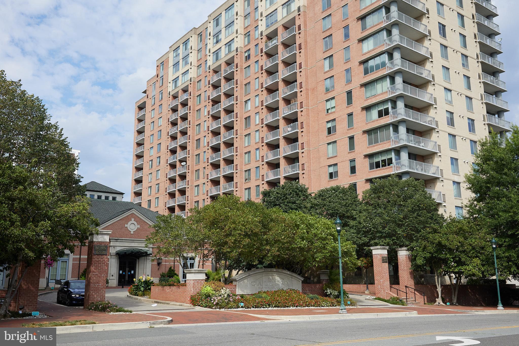 Pristine 1-bedroom, 1-bathroom condo with garage parking at The Gallery at White Flint. Situated on the 6th floor, this beautiful unit offers an open-concept kitchen, a spacious living room, a large bedroom, hardwood floors, a west-facing balcony, abundant storage, and the convenience of an in-unit washer and dryer.

The Gallery is a full-service building with exceptional amenities, including a 24-hour front desk concierge, a cozy lounge/party room with a fireplace and bar, a billiards room, a fully equipped gym, a meticulously maintained courtyard, and a fantastic pool. This unbeatable location places you just moments away from dining, shopping, and entertainment at Pike & Rose, plus it's only a block from the Metro for easy commuting.
