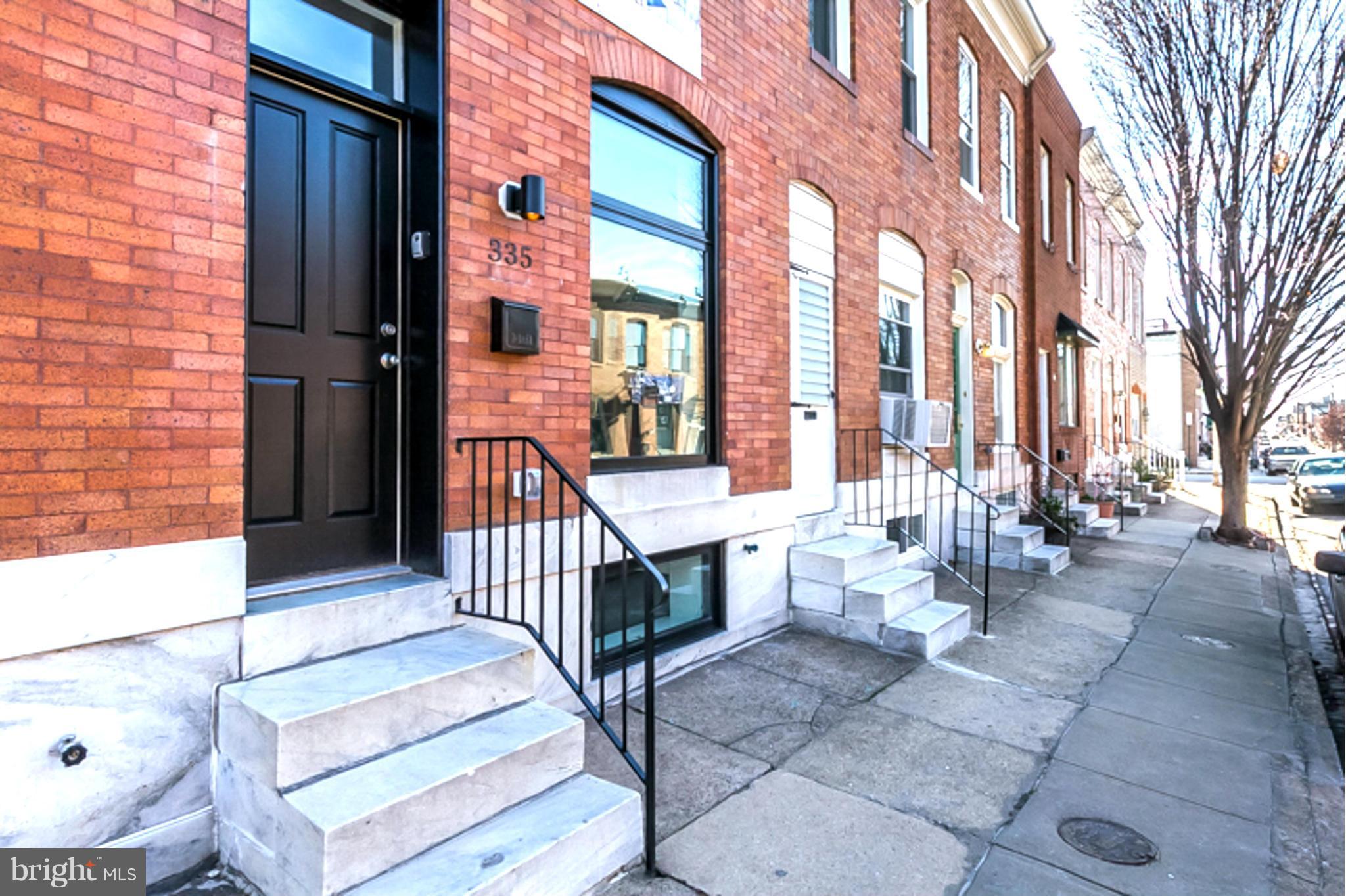 WELCOME HOME!  PARKING, ROOF TOP DECK, & 10yr Tax credit! Another STUNNING renovation by TLC Real Estate Group! Pick the last finishes! Custom Kit w/ SS Appliances, gorgeous Hardwoods, Open light filled floor plan, spacious Master  with full bath. 2nd bedroom with hall bath. Finished lower level with bedroom and full bath! Best value around! Move in, in time for Spring parties on the roof deck!