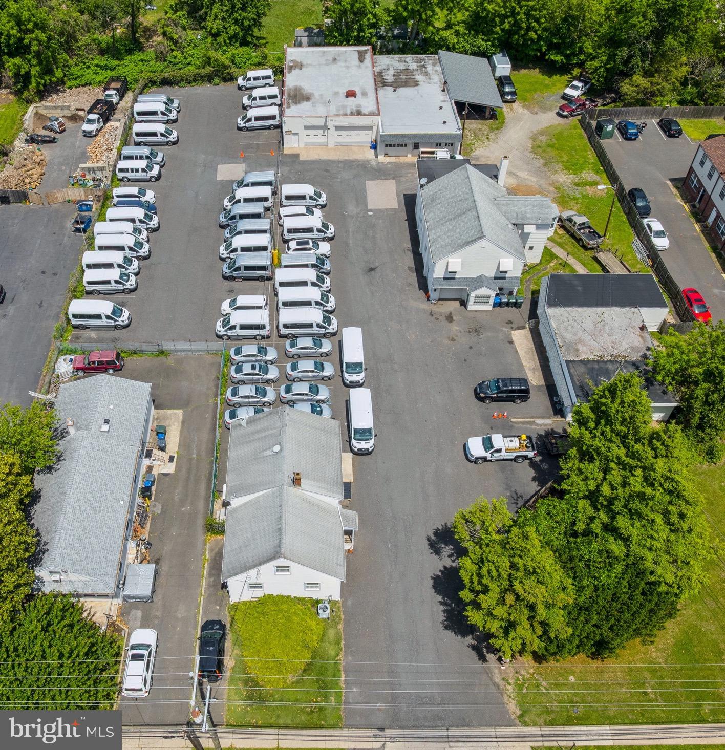 Prime commercial opportunity on 1.89 Acres, featuring three parcels sold together with five buildings: a duplex,  office spaces, and multiple garages. The property offers ample parking, excellent visibility, and high traffic exposure. 
Conveniently located near the PA Turnpike, close to shopping and everyday amenities. It is also within walking distance to public transportation, making it easy to commute to downtown Philadelphia.
Ideal for investors or owners looking for versatile, income-producing property in a highly accessible location.