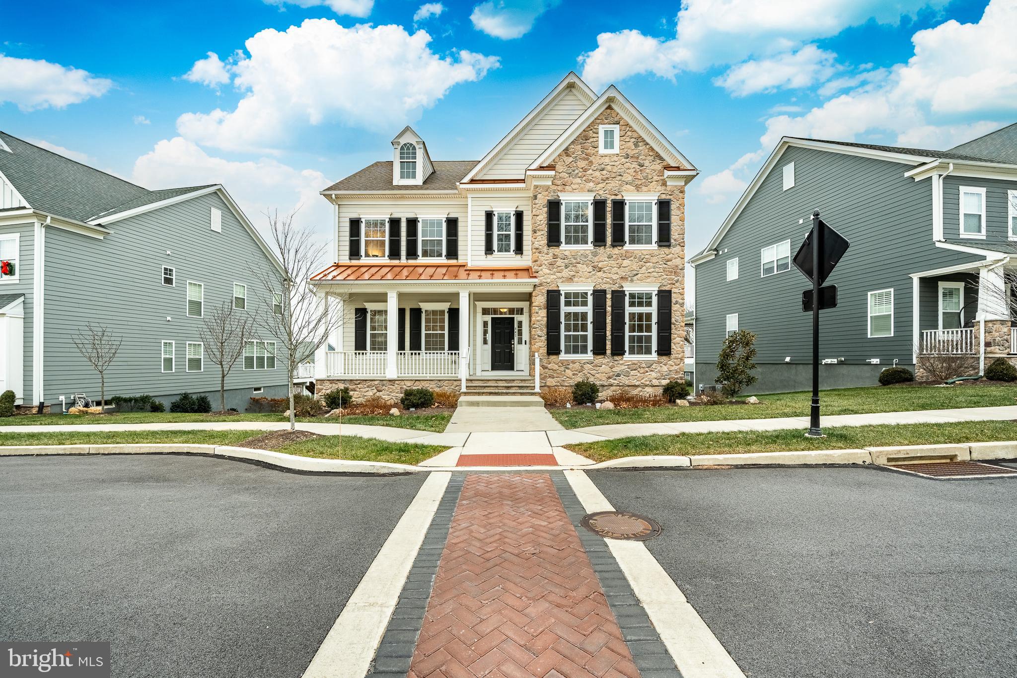 Spring Oak • Charlestown Township • 5 Bedrooms | 5.5 Baths
Welcome to one of Spring Oak’s finest homes—an exceptional Melrose model offering five bedrooms, five-and-a-half baths, and luxury upgrades at every turn.
Inside, the main level features a first-floor guest suite, hardwood floors, and an incredible chef’s kitchen fully outfitted with quartz countertops, a tile backsplash, walk-in pantry, butler’s pantry, and premium cabinetry and appliances. The kitchen flows seamlessly into the family room, capturing beautiful natural light and open views.
Entertaining spaces extend outdoors with a covered deck plus a covered patio with a built-in grill, perfect for year-round enjoyment.
Upstairs, the primary suite offers two spacious walk-in closets and a spa-style bath. Three additional bedrooms include a princess suite and two bedrooms connected by a Jack & Jill bath, along with a convenient upstairs laundry room featuring upgraded built-in cabinetry.
The finished daylight basement adds even more living space with a full bath and direct access to the patio. A massive driveway leads to the rare 3-car tandem garage, providing outstanding parking and storage.
Located in the coveted Spring Oak community—known for its clubhouse, fitness center, pool, walking trails, playgrounds, and low-maintenance living—this home represents one of the most impressive examples of the Melrose floor plan.