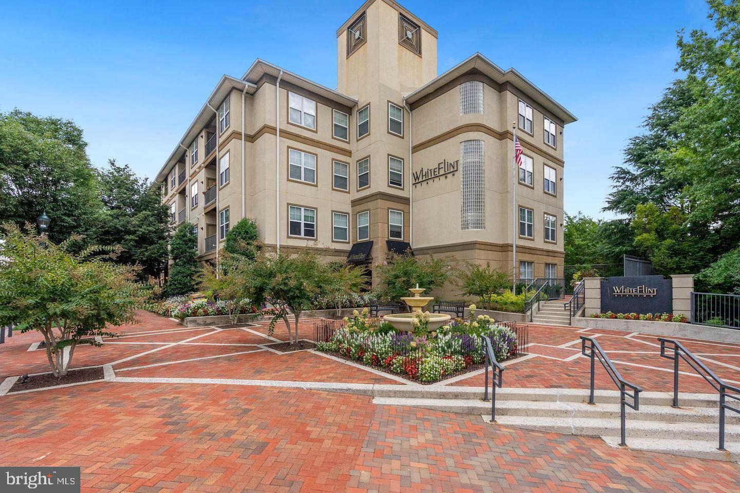 First Time Homebuyers Only - NO Income Limits on this MPDU Unit - FHA Approved.    This two-bedroom, two bath condo unit is listed way below market value in White Flint Station featuring an open floor plan, high ceilings, Trex balcony, gourmet kitchen with deep and tall cabinets and newer stainless-steel appliances (brand new Refrigerator on its way).   A separate dining room and a breakfast bar for additional seating.  The bedrooms are at opposite ends of the unit, providing the utmost in privacy. The primary suite features a walk-in closet and a large bathroom with a tub-shower. The second bedroom includes a walk-in closet and a full bath right outside the room.  The unit also features a separate laundry room with full sized washer and dryer for added convenience.  Updates include fresh paint throughout, crown molding, new LVP flooring, and new upgraded carpeting recently installed, new water heater, and 4 new storm windows.  1 assigned garage space is included in the price. The community is managed by an onsite manager and evening concierge. The owners can enjoy a 24-hour fitness center, outdoor pool and hot tub spa, two tier party room with fireplace and billiard table, coffee bar, BBQ, meeting room, library, and business room. White Flint Station by Toll Brothers is an amenity-rich community conveniently located between robust Bethesda and Rockville town center with plenty of restaurants and entertainments. It is surrounded by conveniences North Bethesda has to offer, like next to White Flint Metro, Pike and Rose, Harris Teeter, Target, Congressional Plaza, Super Giant, Whole Food and Upcoming Wegmans.   Don't miss the opportunity to make this lovely condo your new home. Schedule a showing today and experience the lifestyle that awaits you.
