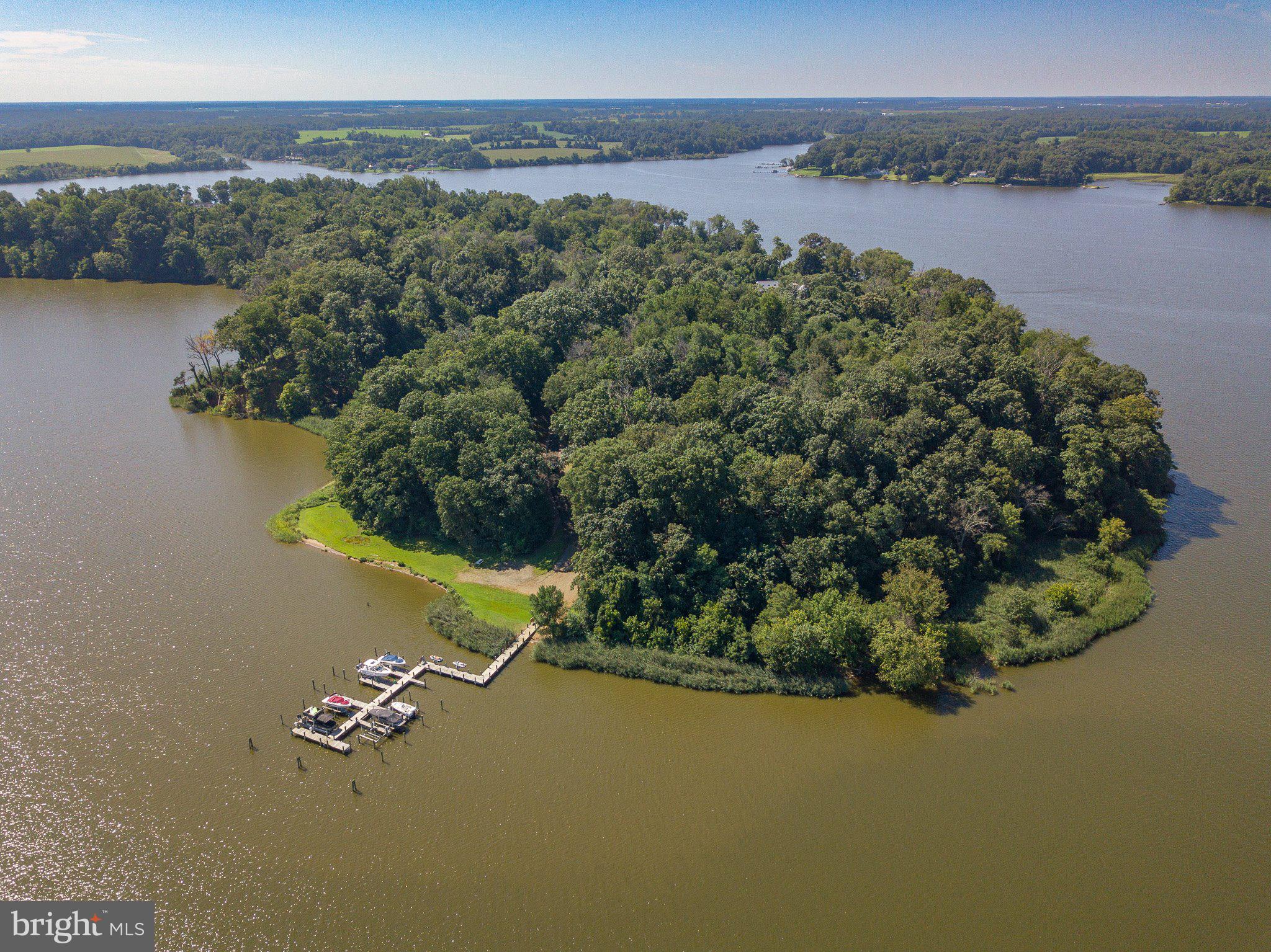 ​Remarkable opportunity to acquire 5+ acres of pristine waterfront property, allowing you to build your dream home!

This parcel boasts a western orientation, treating you to awe-inspiring sunset panoramas of the confluence of Forman Creek and the Sassafras Rivers. Nestled within the secure confines of the Knight Island Preserve, this gated community promises exclusivity and the luxury of relishing your personal piece of paradise.

The neighborhood comprises 20 home sites dispersed across a 390-acre peninsula. Notably, 260 acres of this peninsula are encompassed by the inviolable NALT Knight Island Preserve, ensuring perpetual natural beauty and precluding any future development.  There are 5 miles of hiking trails maintained by NALT within the community. 

Included in this offering is an invaluable boat slip at the community dock, allowing swift access to the pristine waters of the Chesapeake Bay. Furthermore, a convenient 32' storage garage within the community is at your disposal, accommodating your vehicles, boats, and recreational equipment.

Truly, the potential is boundless with this unique and unparalleled property, beckoning you to fashion the lifestyle you've always envisioned.
