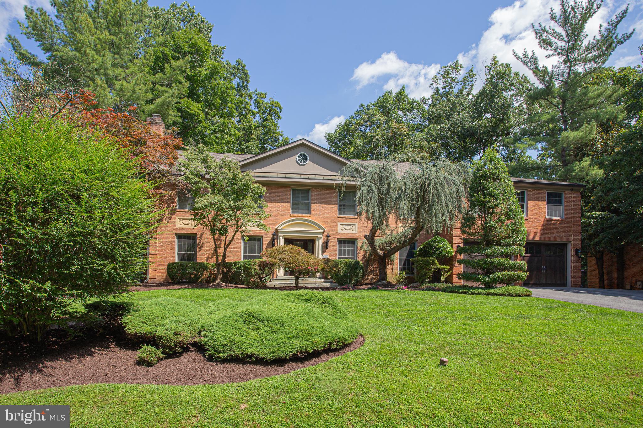 Solidly constructed and added on to in 2005,  this gorgeous, six bedroom home close to Potomac Village. The open, main floor features beautiful Travertine flooring in the foyer, a kitchen also with Travertine and custom cabinetry, large island with bar seating, Viking appliances, open to a large family room...all at walkout level to the spectacular rear yard.  Rear deck, heated pool and spa, expansive pool stone hardscape, rock retaining wall with waterfall feature,  and additional green space make this the perfect back yard! The large mudroom also offers a full bath for pool use in and out.  The upper level features a large owner's suite overlooking the rear yard, a large walk in closet, bath with double vanities, separate shower and tub, and new carpeting. Additionally, there are four more bedrooms, a large laundry room, and a second recreation/hangout room for the kids! The lower level will provide the new owner a sixth bedroom and full bath, recreation room and work out room with plank flooring.
