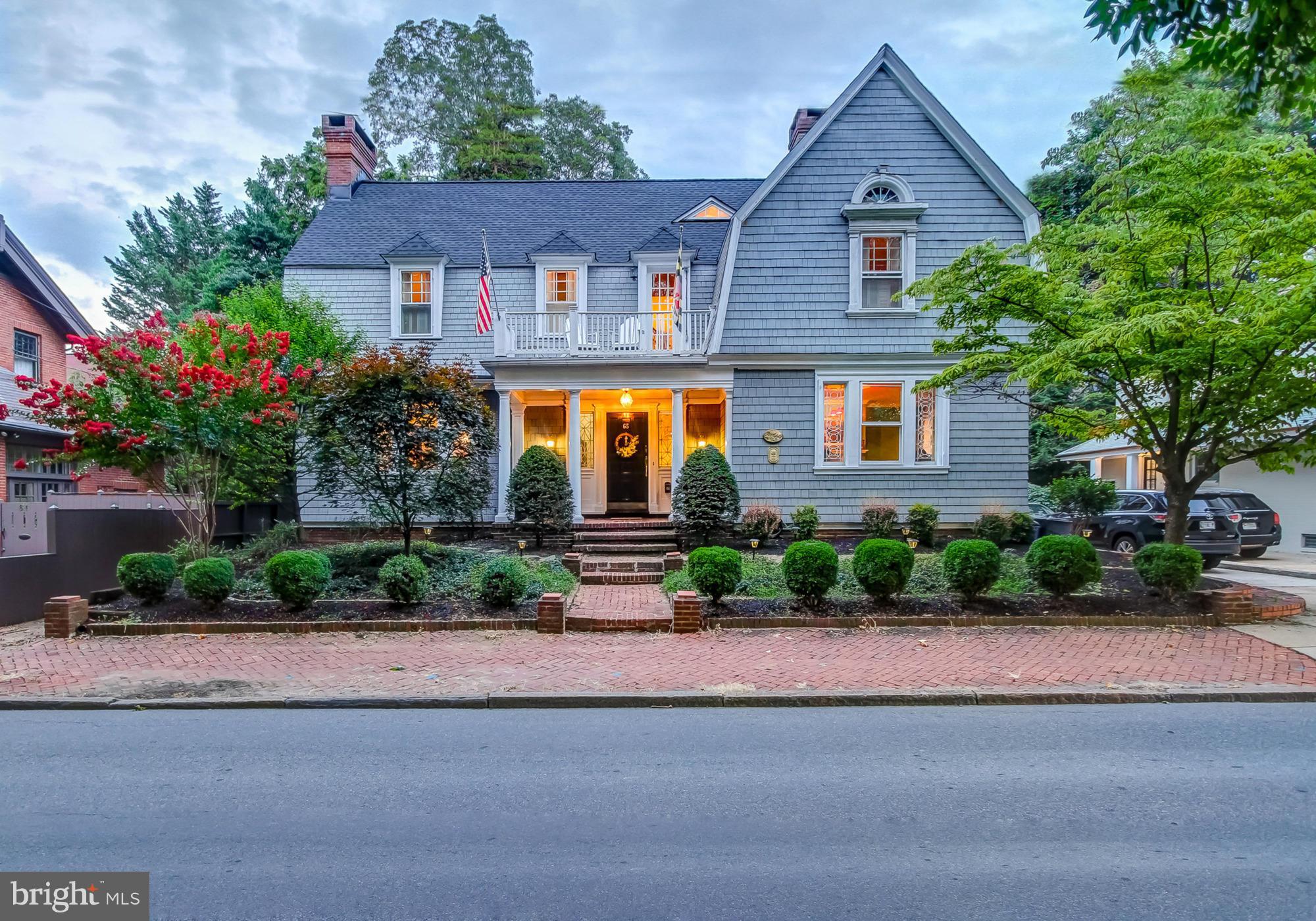 A Grand Historic Beauty! Opens to a spacious foyer and center hall.  The embassy sized dining room features custom built-in china cabinets with gorgeous lead glass & fireplace.  All 6 bedrooms are en-suite plus an apartment with private entrance. All electrical, plumbing and HVAC are built to commercial standards. New roof installed in June.  Incredible income potential. Off street parking for 3