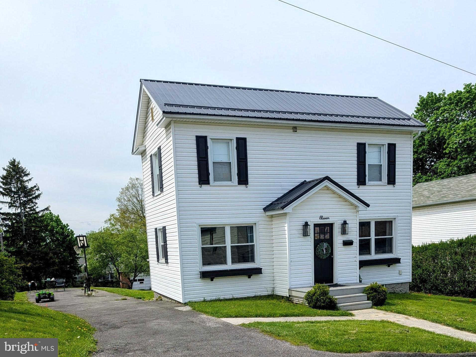 This Charming, fully renovated home is nestled on a hill overlooking the beautiful town of Frostburg. The property offers a combination of space, style, and walkability! The home features a bright open interior. A chief inspired kitchen features granite counter tops, stainless steal appliances, and ample storage. The property has a large backyard and plenty of parking out front or at the alley in the back. The home has a durable metal roof that will last for may years to come. This on is going to go fast! Don't miss out on this amazing home!