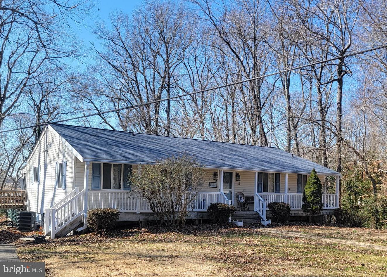 Do not walk out on walkaway to pier. Not safe. .  This is Waterfront on the Patuxent 4.37 acres its 2 lots together cant be separated . It has an inground pool the liner is new as of last year. The roof was put on in the last few years. 
2 bedrooms and 2 bath upstairs. It has a living room in the front of house. The kitchen has a dining room off of it. There is a screen porch the length of the home in the rear. There is a handicap ramp in the rear to enter the home thru the bedroom slider on the porch. There is a handicap bathroom upstairs as well.