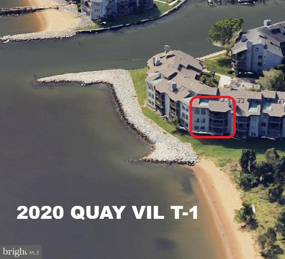 OPEN SUNDAY 12-3 === WATERFRONT= ONE BEDROOM "C" FLOOR PLAN = EXTRA WIDE CONDO:  Four pane sliders in living room and there are 4 glass pane windows in master bedroom == Master has a private exit door to a beach front patio == Front row seats for the Blue Angels flyover and weekly regatta races ... Amenities galore with two community pools / pool house complexes  - one directly on the bay == two community sports courts - one by Chase Pond. Onsite Gourmet Cafe - the 'Beacon' overlooking a privately owned 200 slip Marina and just an oyster shell path stroll to the private 1600-foot sandy bayfront beach with a small craft storage area... The front entrance is secured 24/7/365 and the security team walks the premises daily...  HOA and CONDO fees are very affordable compared to other areas. Direct entrance walkway already in place from car park for handicap adaptable--- can further level entrance steps to kitchen...