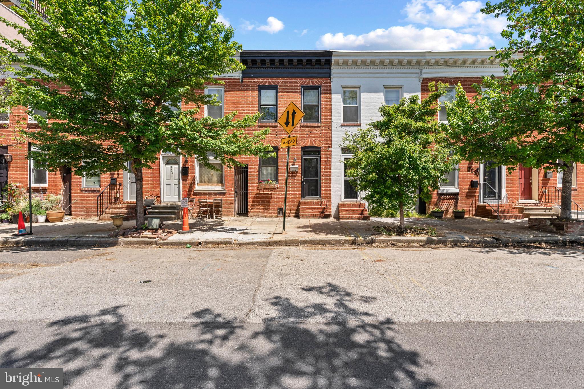 Welcome to this clean, and beautifully updated 2 bed, 2 bath brick front townhome in the heart of Canton, just a few blocks from the waterfront. This home features an open, light-filled layout with a spacious main living area with stunning hardwoods, and a bonus second living space off the kitchen—perfect for entertaining or flexible use. Upstairs, you’ll find two generously sized bedrooms with high ceilings, offering both comfort and character. Enjoy city living at its best on the rooftop deck—ideal for summer nights. Amazing location close to shopping, entertainment, Canton waterfront etc.  A rare opportunity on one of the most desirable streets in the neighborhood, don't miss it!