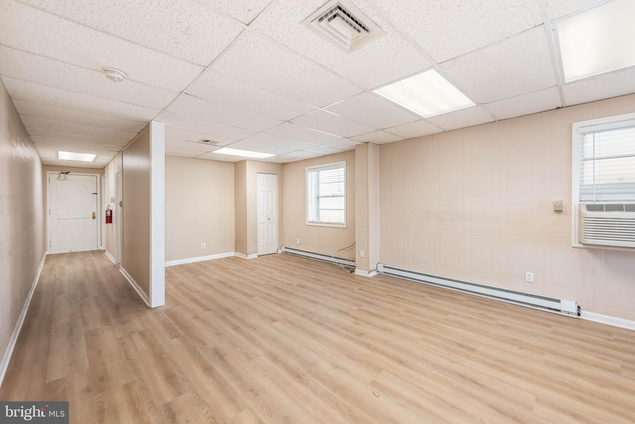 PRIME COMMERCIAL RETAIL OR OFFICE SPACE - EXCELLENT SIGNAGE - This ground level unit is located on Pulaski Highway in Rosedale. It offers excellent signage. Estimated 650 square feet. Tons of parking. 60 shared parking spaces. Unit has air conditioning and heat. This space has a full kitchen and powder room. New LVL flooring just installed. Ready for immediate occupancy. Tenant pays electric.  Triple Net Lease - CAM approximately $200/mo