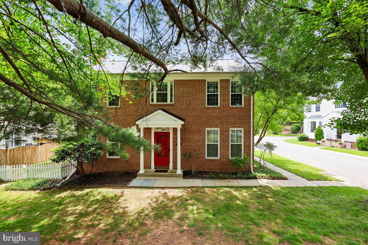 This classic colonial was thoughtfully updated and offers the perfect blend of timeless charm, functional living space, and modern improvements in the sought-after Montgomery Village community. From the moment you arrive, you'll appreciate the home's attractive curb appeal, well-maintained exterior and privacy overlooking common area. Inside, the rooms are spacious with tasteful updates and quality finishes creating  a warm and inviting atmosphere that is ready for you to move right in. The main level features beautiful hardwood flooring that adds warmth and elegance, detailed moldings and trim work to showcase the home's craftsmanship and add character to this first floor.  The floor plan offers excellent flow for both everyday living and entertaining. The formal living and dining rooms provide comfortable gathering spaces, while the heart of the home is the kitchen which combines style and functionality with beautiful granite countertops, ample cabinet space, and stainless steel appliances. Whether preparing daily meals or hosting special occasions, you'll appreciate the workspace and convenience this kitchen provides. And to add to all of that, what's better than to have the family room open to the kitchen! This spacious room features a cozy fireplace, creating the perfect setting for relaxing evenings, holiday gatherings, or spending time with family and friends. Large windows allow natural light to fill the space, enhancing the home's welcoming atmosphere.  Don't forget there is a half bath perfectly located away from the kitchen. Upstairs, also with hardwood floors, the bedroom level offers four generously sized bedrooms, providing flexibility for family members, guests, home office needs, or hobbies. The expansive primary suite serves as a private retreat and includes access to a full bath and large walk-in closet. A second full bathroom on the upper level accommodates the additional bedrooms. The finished basement significantly expands the living space and offers endless possibilities. The recreation room has a wet bar and lots of storage space under the stairs. It is also improved with a half bathroom and small den & laundry room. Fresh paint throughout the home and new carpet provides a clean, bright, and contemporary feel, complementing a variety of decorating styles. This thoughtful floor plan ensures functionality across all three levels of the home. Outside there is a multi-level patio, fenced back yard and an attached one car garage with lots of shelving in the garage.  All of this and in Montgomery Village with use of lots of pools, lakes, tennis courts and more!! Easy access to I-270, Rt 200, 124 & 355.
