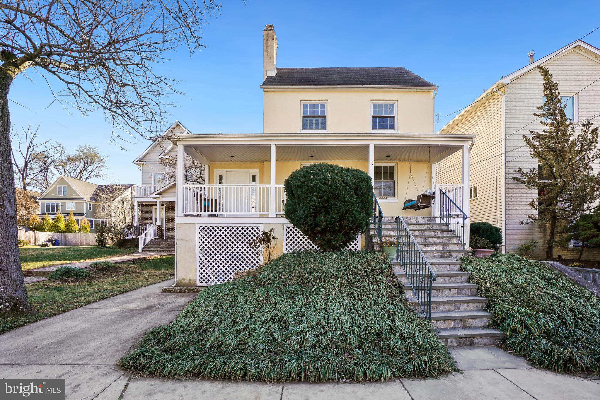 Located on a quiet street in walkable East Bethesda this spacious house with gleaming hardwood floors throughout, a supersized great room, and separate living space in the above-ground lower level await your visit.  First notice the large front porch with plenty of space to enjoy the outdoors and visit with neighbors. From the foyer, you will step into the living room with a fireplace and move into the kitchen. The back of the house is an enormous great room with a large fireplace, table space, a storage closet, and access to the back deck. Upstairs is the primary suite with an attached office area, walk-in closet, and a spa-inspired bath.  There is a second bedroom and hall bath on this level.  The attic level houses the big third bedroom with an en suite bath. The lower living level has a separate side entrance and includes a spacious great room, full kitchen, laundry, bedroom with en-suite bath, and a powder room. Located just steps from Metro, NIH, Walter Reed and all the lively restaurants, shopping, and entertainment Bethesda has to offer. 
 Make this house your next home.