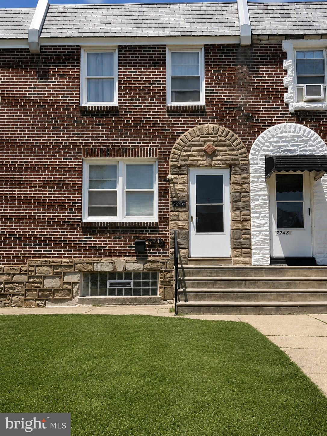 Welcome to this well-maintained brick rowhome offering a spacious and functional layout in a convenient Northeast Philadelphia location. The main level features a bright living room with hardwood flooring, a separate dining area, and an eat-in kitchen with ample cabinet and counter space. Upstairs you'll find comfortable bedrooms with generous closet space and a full hall bathroom. The lower level includes a clean basement with laundry area, additional storage space, and direct access to the attached garage. The rear driveway provides off-street parking in addition to the garage. Outdoor spaces include a front lawn and rear yard area, perfect for relaxing or gardening. Conveniently located near shopping, restaurants, schools, public transportation, and major commuter routes. A great opportunity for both owner-occupants and investors alike.