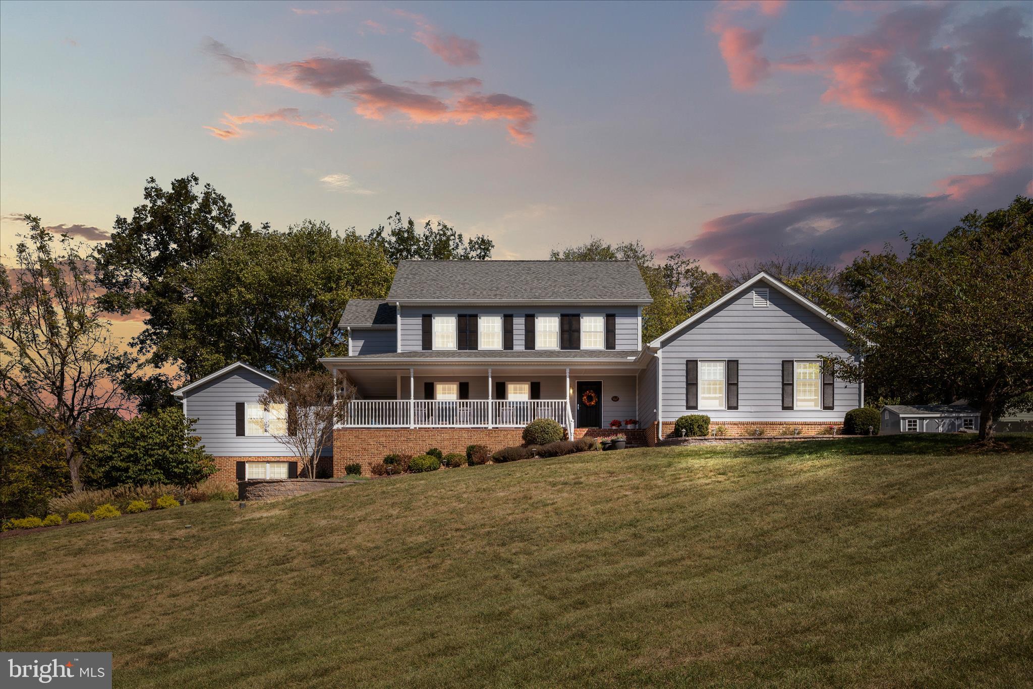 Step into timeless elegance with this stately Colonial, set on nearly an acre of picturesque land. Blending classic charm with thoughtful modern upgrades, this home offers the perfect balance of comfort, space, and sophistication.

The current owner has invested over $150,000 in upgrades since purchasing, including a fully renovated HVAC system with all-new ductwork and high-end components delivering efficiency and peace of mind.

Enjoy the convenience of a private main-level primary suite with a beautifully updated en-suite bath. The main level also features rich hardwood floors, a gourmet kitchen with induction stove, formal dining room, spacious family room, elegant living room, and a dedicated private study—designed for both everyday living and entertaining.

Upstairs, a second expansive primary suite offers ideal flexibility for guests or multi-generational living, along with four additional generously sized bedrooms.

This home delivers exceptional space with a walk-up fourth-floor attic, partial unfinished basement, and abundant storage throughout.

Step outside to a beautifully designed paver patio, expansive deck, new shed, and serene views that enhance the property’s natural setting.

No HOA—giving you the freedom to truly make this property your own.

This isn’t just a home—it’s a lifestyle upgrade.