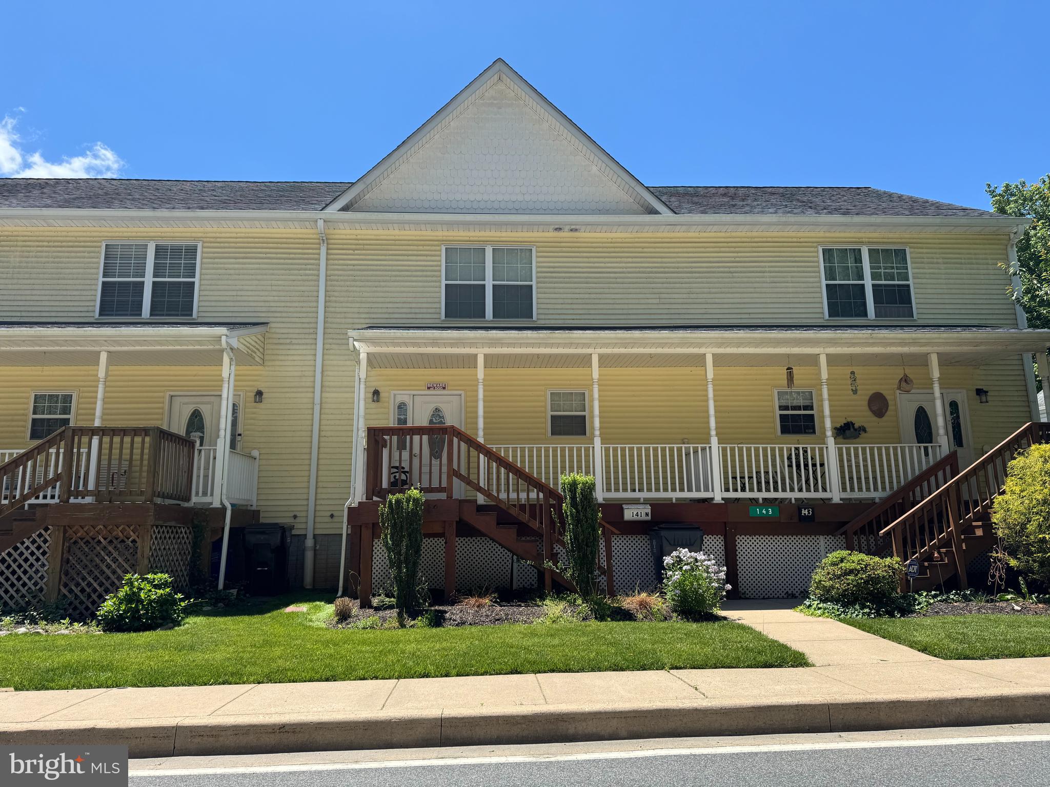 Welcome to 141 N. Main Street in the quaint, Historic town of Port Deposit! This  townhome offers a great floor plan with spacious rooms throughout & beautiful views of the Susquehanna River. The front of the home is at street level & features a covered front porch. The main level offers a large eat-in kitchen with abundant cabinet storage space, a pantry, great counter work space, recessed lighting & a ceiling fan! The Kitchen is open to the large Living Room with an atrium door out to the deck with views of the Susquehanna River & gorgeous sunsets! The upper level features 2 large Bedrooms, each with a private bathroom; the Owner’s Suite offers 3 closets, with one being a walk-in and views of the river! The laundry area is located on this level between the two bedrooms. The lower level (bsmt) features a walkout to the carport, which can accommodate 2 vehicles & features carport & indoor storage space.  Flood insurance is included in the monthly condo fee, currently $280 monthly. Conveniently located & within walking distance to the post office, the Marina, parks & many restaurants. Nearby are many activities to enjoy, including fishing, kayaking, boating, shopping, casinos and the Great Wolf Lodge. Short Sale has been approved.