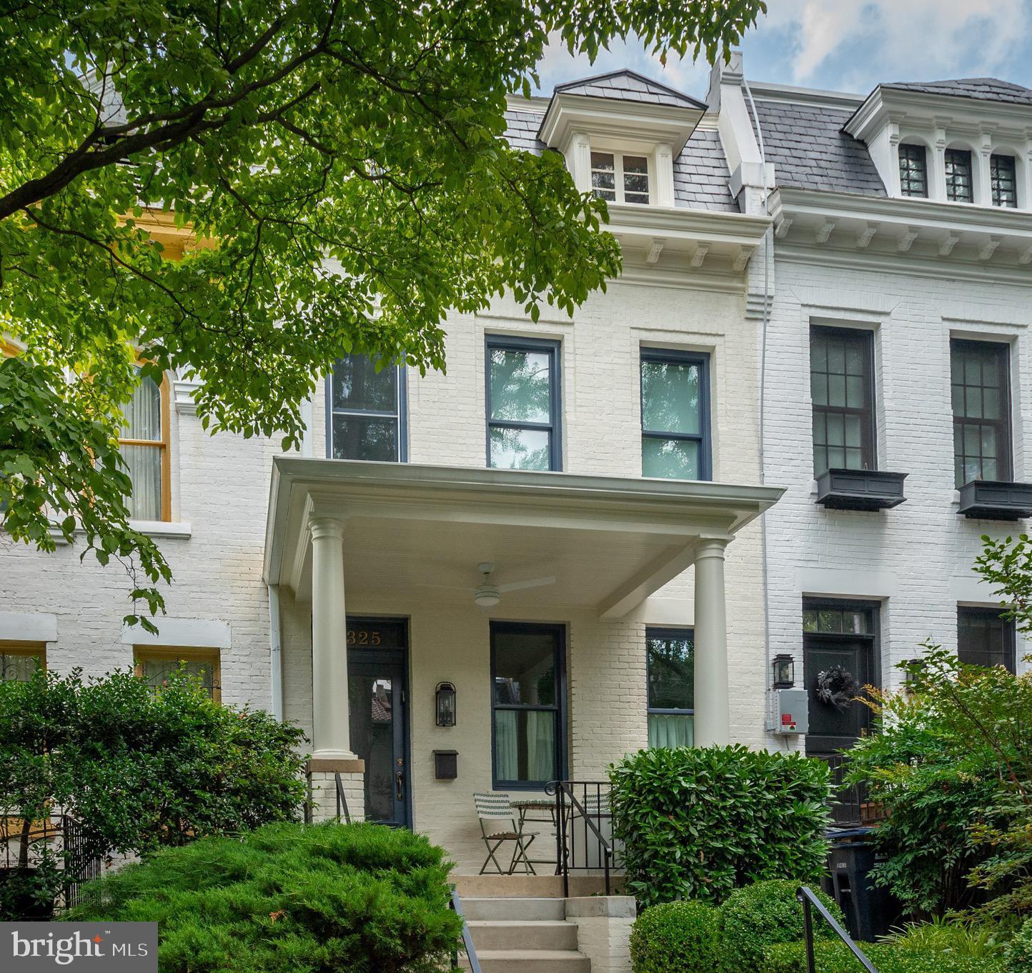 2325 20th St NW is a truly special property showcasing a thoughtful renovation by the boutique design firm Peltrie Place, and features a deep lot offering a large patio and rear yard as well as two car parking. This home has been featured in Architectural Digest highlighting its transformation - every detail has a purpose and creates a sophisticated, luxurious retreat with intentional living spaces. The main level has a spacious living room with fireplace, dining room, a chef's kitchen that opens to a breakfast nook and family room before leading to the back deck, patio and yard. The upper level has a generous primary suite with a large walk-in closet and spa-like primary bath. There are two additional bedrooms and full bathroom as well as laundry and a large custom-built office space. The lower level has a fabulous custom bar below the stairs and a great family room with custom built-ins. There is an additional bedroom, full bath, gym or storage room and large laundry room with additional storage. The outdoor space completes this incredible offering with a rear deck, expansive patio for entertaining and additional rear yard. There is also a roofdeck off the primary suite providing incredible views of the city. Two car parking included.