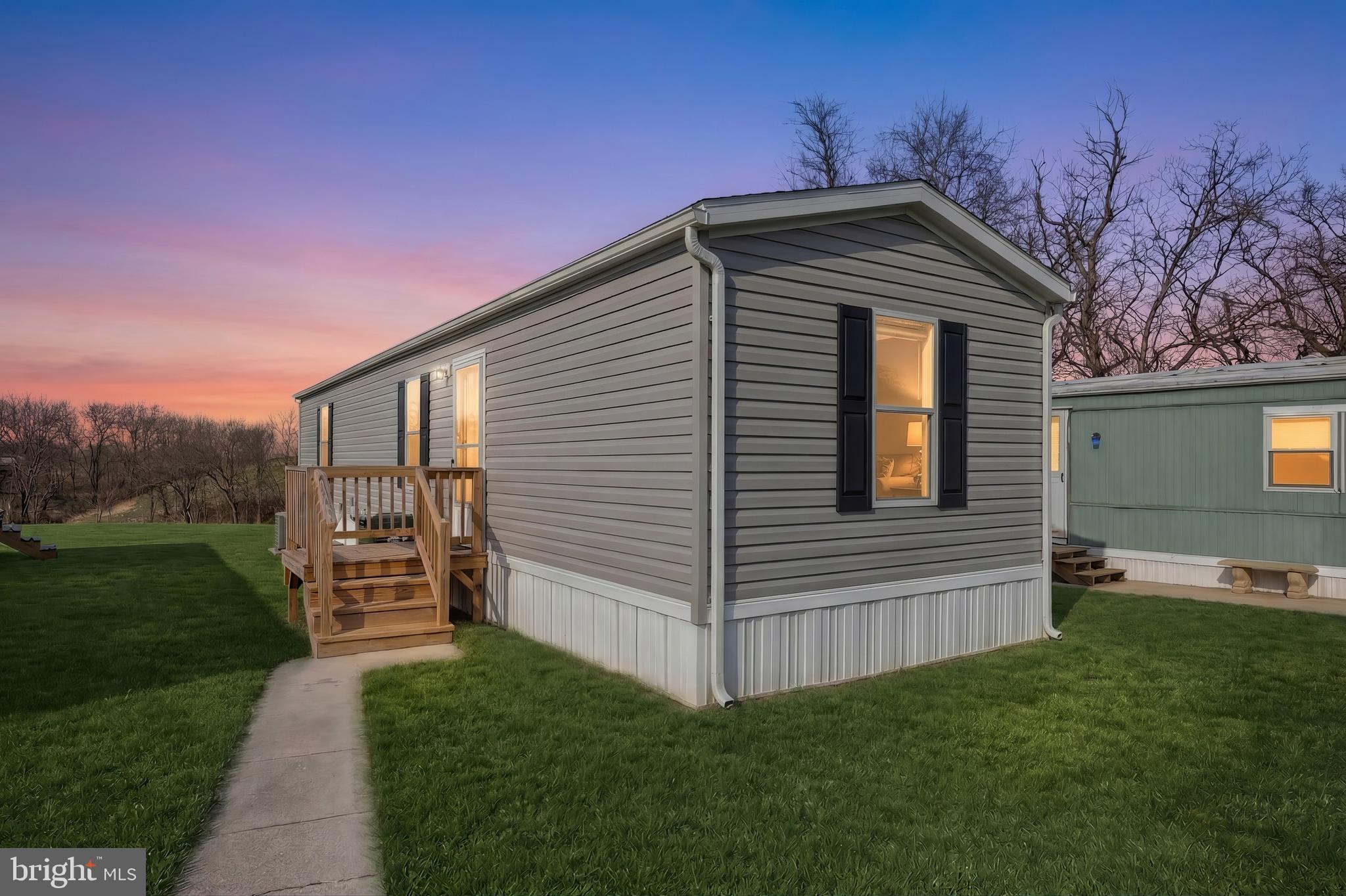 Discover exceptional value in this beautifully designed 2023 singlewide mobile home featuring 2 bedrooms and 2 full bathrooms. Thoughtfully crafted for comfort and efficiency, this residence is ideal for first‑time buyers, downsizers, or anyone seeking an affordable, low‑maintenance lifestyle. A bright and spacious living room welcomes you with plenty of room for relaxation or hosting guests. The modern kitchen is equipped with newer appliances—including a refrigerator and range, making meal prep both easy and enjoyable. An efficient propane furnace ensures reliable warmth throughout the colder months. Additional conveniences include a dedicated laundry room and a layout that maximizes both functionality and style. This home delivers affordability without compromise, offering a comfortable living environment at a price that makes sense. Home backs up to farmland and  situated in Paradise Homes Community, you’ll be close to everyday essentials, local dining, and recreational amenities. Don’t miss your chance to own a modern, move‑in‑ready home that blends comfort and value seamlessly. Owner motivated,  priced to sell well below new home price!