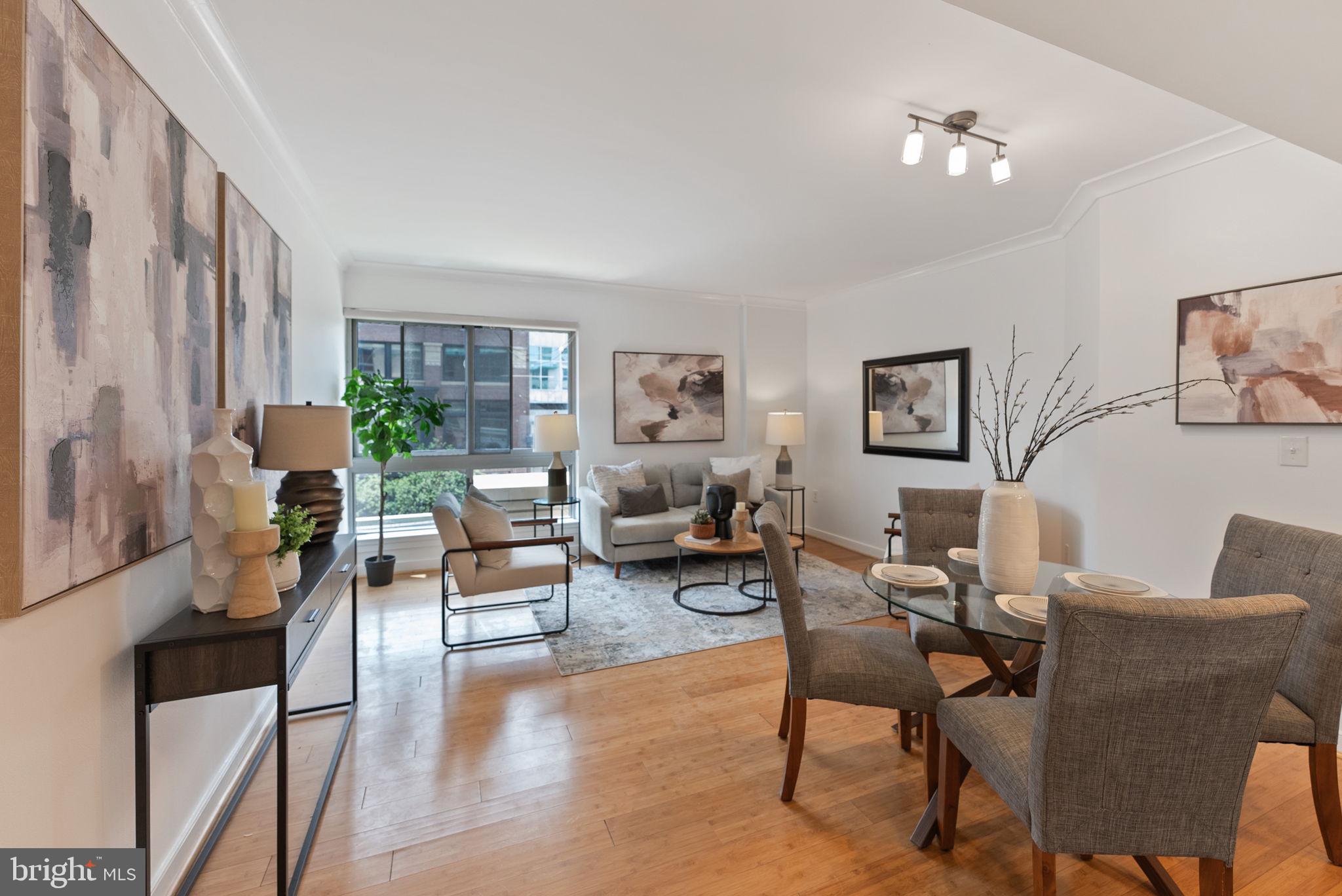 Freshly updated and perfectly positioned in the heart of Downtown DC, this move-in ready condo at The Residences at Gallery Place offers convenience, comfort, and unbeatable city access. Located just moments from Gallery Place Metro, Capital One Arena, restaurants, coffee shops, shopping, nightlife, and museums, this is true lock-and-leave city living.

Inside, the home features brand new stainless steel appliances, fresh paint throughout, updated lighting, hardwood floors, oversized windows, and an open-concept layout filled with natural light. The spacious bedroom and large full bath offer comfortable everyday living, while the in-unit washer/dryer and central A/C add convenience.

Residents enjoy premium building amenities including 24/7 concierge service, a fitness center, and rooftop terrace. Pet-friendly and investor-friendly, this is an excellent opportunity for both owner-occupants and savvy investors seeking a prime downtown location.