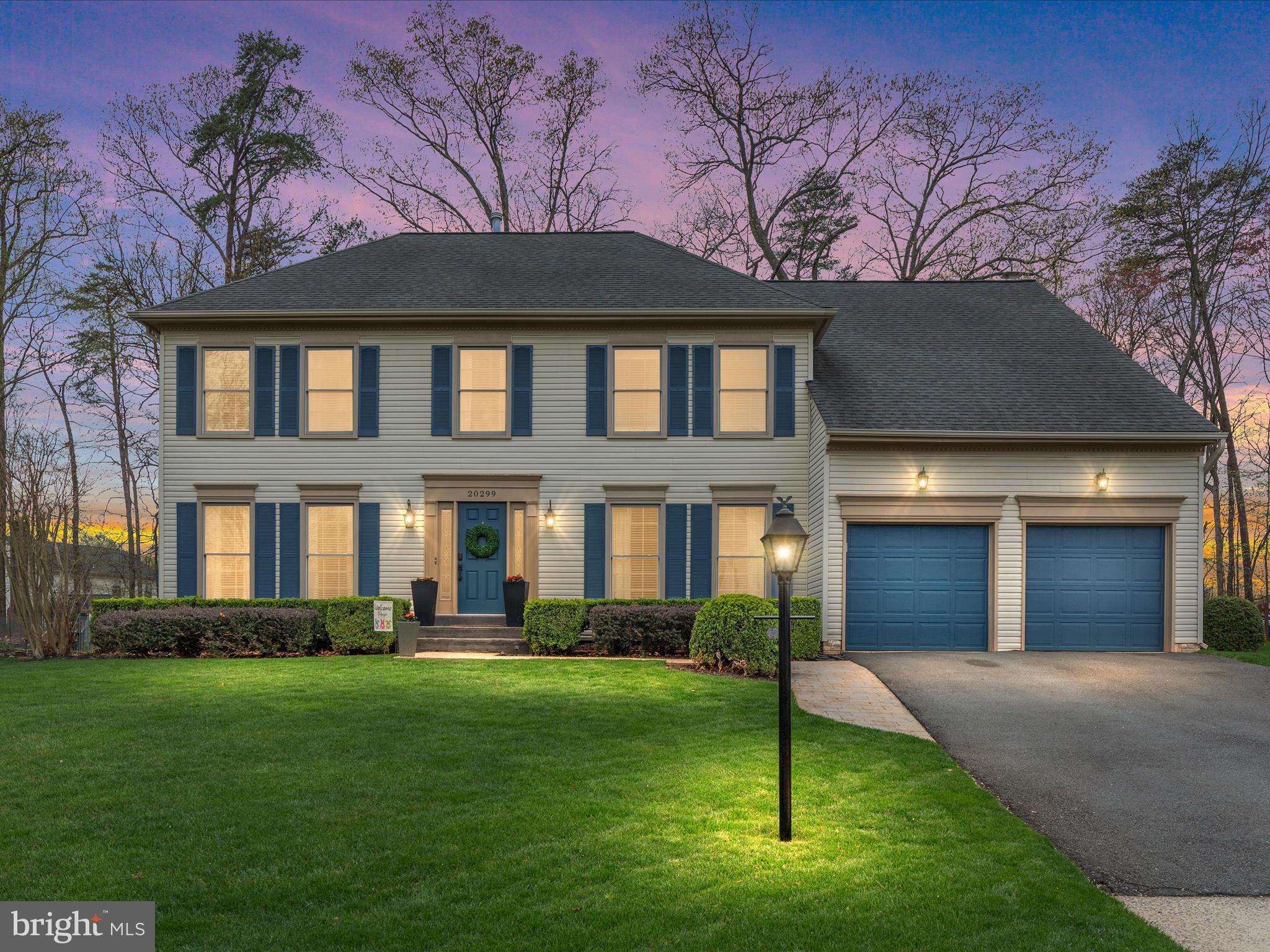 Welcome to amenity-rich Ashburn Village!
Nestled on a cul-de-sac at 20299 Mustoe Place, this beautifully maintained Jamestown Model sits on a desirable lot backing to a wooded common area. With 4 bedrooms, 3.5 bathrooms, and over 4,600 square feet of living space, this home offers room to live, work, and relax in comfort.
Step inside to a two-story foyer that offers hardwood floors that flow throughout, study, living room, and dining room. The spacious family room features a wood-burning fireplace (with gas hookup available for easy conversion) and opens to the private backyard and patio through sliding glass doors—perfect for entertaining or quiet evenings outdoors.
The renovated kitchen is a standout with modern shaker-style white cabinetry, stainless steel appliances, and marble countertops. Off the kitchen, you’ll find a handy mudroom—ideal for coats and shoes. (It also has washer/dryer hookups if you'd like to move laundry back to the main level.)
Upstairs, retreat to the expansive owner's suite with a sitting room—great for reading, TV time, or a second home office—two closets, and a fully renovated en-suite bathroom. Three additional generously sized bedrooms share a second renovated full bath with a double vanity.
The finished basement adds even more flexibility with new luxury vinyl plank flooring, abundant storage, and a full bathroom—perfect for guests, a home gym, and more.
Located just minutes from Route 7, Route 28, One Loudoun, Dulles Airport, and a mere 4.5 miles to the new Silver Line metro, Ashburn Village is renowned for its exceptional amenities. Enjoy three neighborhood community centers, four outdoor pools, 17 tennis courts (including a year-round tennis bubble), four basketball courts, multipurpose courts, a dog park, eight playgrounds, six pickleball courts, 50 miles of trails, baseball and soccer fields, a fitness trail, over 500 acres of open outdoor space, and eight lakes and ponds for catch-and-release fishing and canoeing. The Sports Pavilion, offering fitness and tennis programs, a fully equipped gym, indoor pool, racquetball courts, sauna, and a full gymnasium, stands out as a unique and enticing amenity. Community events such as fireworks, festivals, holiday celebrations, and more add to the vibrant lifestyle of Ashburn Village. Realtor Owned