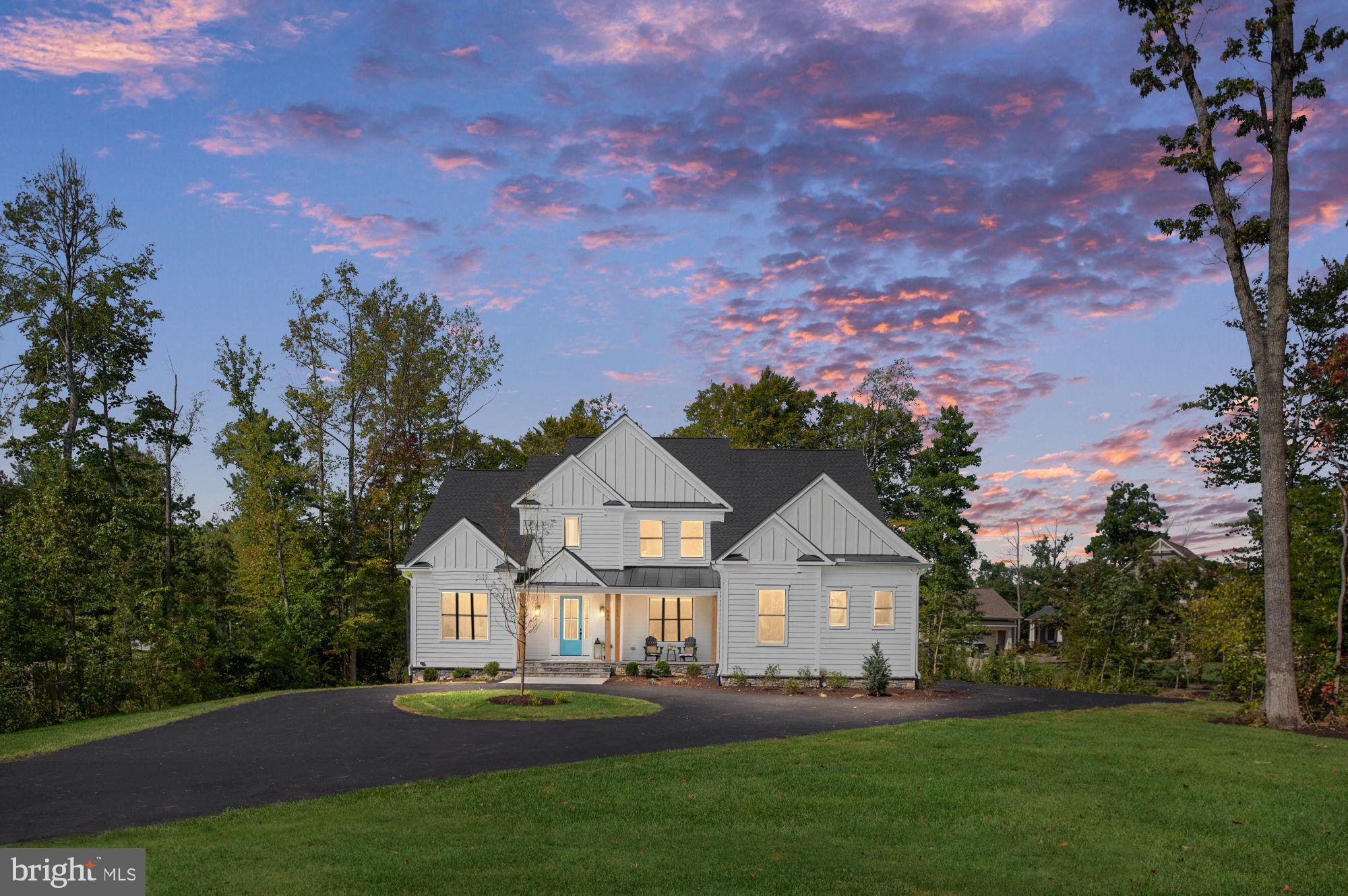Waterfront Paradise at Lake Anna! 

Dive into luxury with this stunning waterfront home, perfectly designed for relaxation and adventure! Spanning three finished levels, this gem features a fabulous boathouse and is brimming with upgrades that will make your heart sing!

Imagine arriving home to a captivating exterior of Hardie plank siding and stone, with a spacious three-car garage and a charming circular driveway. Step inside to find an exquisite great room with coffered ceilings and breathtaking views from the first-floor owner’s suite. Slide open the impressive 16'x7' doors to let the lake breeze in!

The fully finished basement is a playground for fun, boasting a recreation room, media room, and kitchenette—perfect for movie nights or game days! Enjoy your morning coffee on the Trex deck or in the stunning screened porch, complete with a ceiling fan and panoramic views of the shimmering waters.

Every detail shines, from the elegant trim and custom closet in the owner's suite to the gourmet kitchen featuring high-end Thermador appliances and chic maple cabinetry.

Lake Anna, a 13,000-acre oasis just 72 miles from DC, offers endless adventures—fishing, sailing, jet skiing, and more await you!

Simply Home, a premier builder from Fredericksburg, Virginia, has crafted this masterpiece with care. Don’t miss your chance to own this slice of paradise!

Prices and options are subject to change without notice.