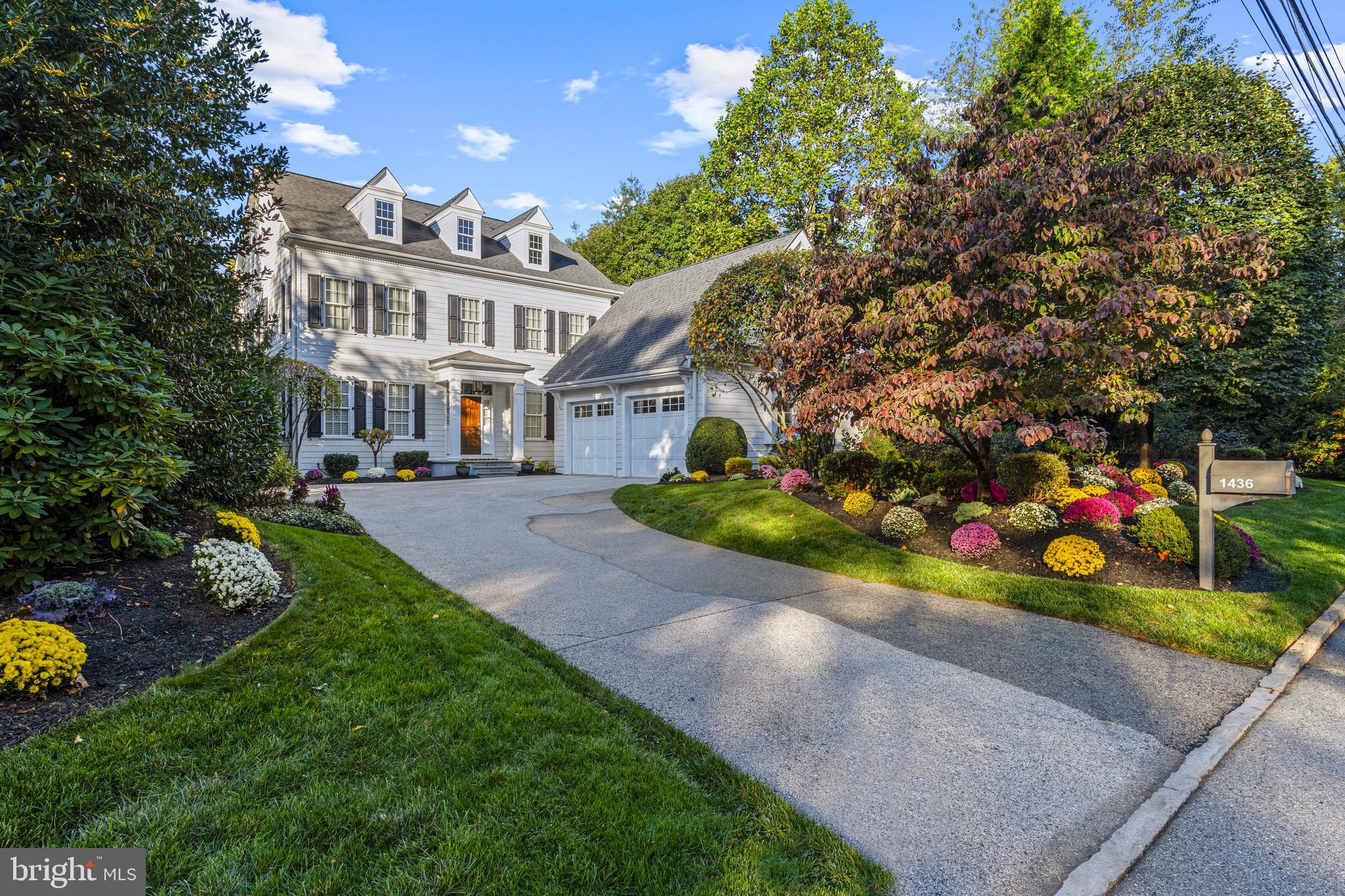 Welcome to 1436 County Line Road! This beautifully-appointed home in RadnorTownship offers timeless elegance, exceptional craftsmanship, and an unbeatable Main Line location. Perfectly positioned within walking distance to the Rosemont Station, Ashbridge Park, Villanova University, and the charming shops and restaurants of downtown Bryn Mawr, this residence delivers both luxury and convenience.

Meticulously maintained and in excellent condition, the home welcomes you through a gracious front hallway showcasing rich hardwood floors that flow throughout the main level. The living room exudes sophistication with crown molding, grasscloth-style wallpaper, and recessed lighting, creating a warm yet refined gathering space. The formal dining room features custom lighting, elegant sconces, detailed moldings, and seamlessly connects to a well-appointed butler’s pantry complete with a wet bar.

The heart of the home is the stunning chef’s kitchen, designed for both everyday living and entertaining. Marble countertops and a generous center island complement a premium Wolf six-burner range with griddle, a vented hood, and picturesque window built into the tiled backsplash. A Sub-Zero refrigerator and sunlit breakfast room complete this exceptional space. Just beyond, the inviting family room offers custom built-ins, a gas-burning fireplace, and a glass door opening to a private flagstone patio with awning and a fully fenced-in rear yard.

A thoughtfully designed mudroom with built-in cubbies, powder room, coat closet, and access to the oversized two-car garage enhances daily living. A rear staircase with an office nook leads to a versatile guest suite with full bathroom and wetbar—ideal as an in-law suite, au-pair quarters, home office, or gym.

Upstairs from the main hallway, the serene primary suite features a tray ceiling, surround sound, two large walk-in closets with built-ins, and a spa-like bath with dual vanities, soaking tub, and frameless glass shower. Two additional bedrooms each offer ample space, double closets and en-suite bathrooms, each with a shower/tub combination. A convenient hall laundry room with sink and a hall linen closet complete this level.

The finished lower level is carpeted with excellent ceiling height and provides multiple living/entertaining areas, an abundance of natural light, and a half bathroom. Also included on this level is an unfinished area with outstanding storage and well-maintained mechanical systems, including 2 high-efficiency HVAC systems (4 zones total) and a backup generator.

Move-in ready and impeccably styled, this 'must-see' Main Line home offers refined living in an extraordinary location!