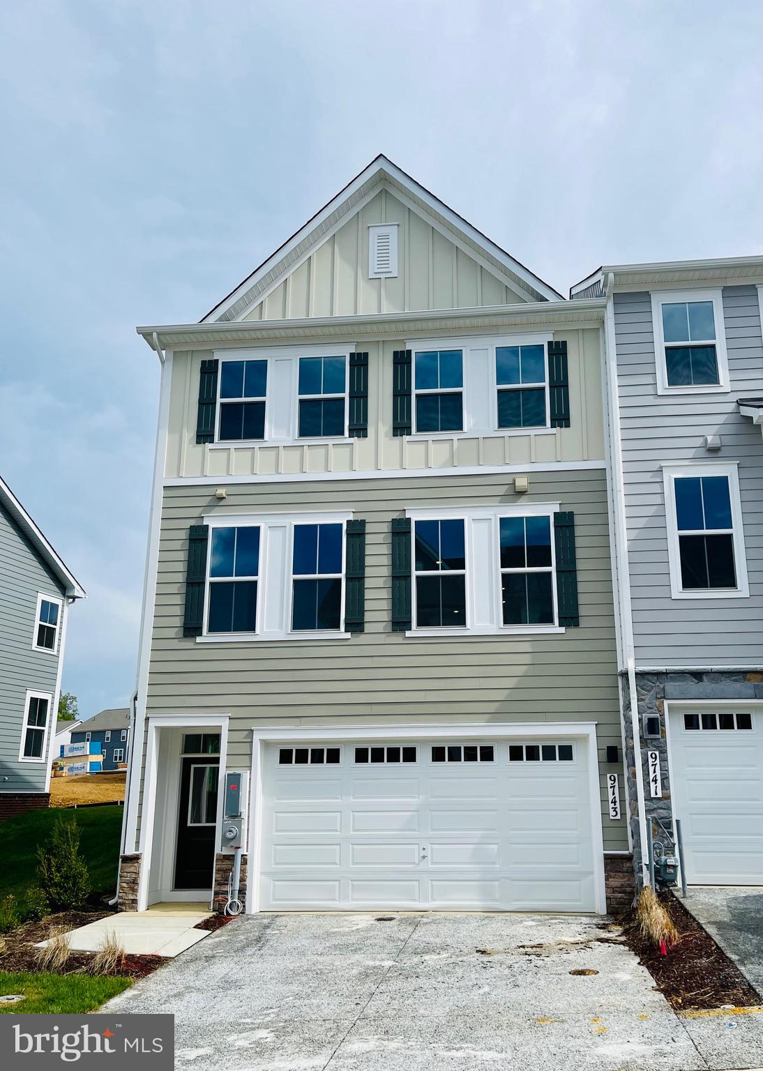 This beautiful 24’ end unit townhouse with a two car garage won’t last long!   As you come in from your two-car garage into your ground level entry, you'll have the convenience of luxury vinyl plank flooring in your entry way which leads to your quiet, carpeted gathering room.  Oak T stairs take you to your main level with your huge gourmet kitchen with oversized island and storage cabinets on both sides of your island.  Show off your cooking skills with your UPGRADED stainless steel appliances including a show piece stainless steel range hood over your cooktop.  Luxury vinyl plank flooring rounds out the main level, including your half bath.  The ample windows allow the sun to pour into this open level.  Sliding glass doors lead to your back yard where you can add a patio in the future.  Take the carpeted stairs up to your bedroom level.  Each secondary bedroom is large enough to accommodate a queen-sized bed and additional furnishings.  Your hall bath has a double vanity (two sinks...lots of elbow room) and a tub shower combination complimented by the upgraded ceramic tile flooring.  In the spacious hallway upstairs, there is plenty of room for a seating area right by the full-sized washer and dryer hook up.  Double doors lead you into your private, spacious owner's suite with an oversized walk-in closet.  The opulent owner's bath has upgraded tile and a walk-in shower with built in bench.  Come see why this floorplan has everyone talking!!!!  Won't last long!  Open daily.  PHOTOS ARE OF SIMILAR BUT NOT EXACT HOUSE.