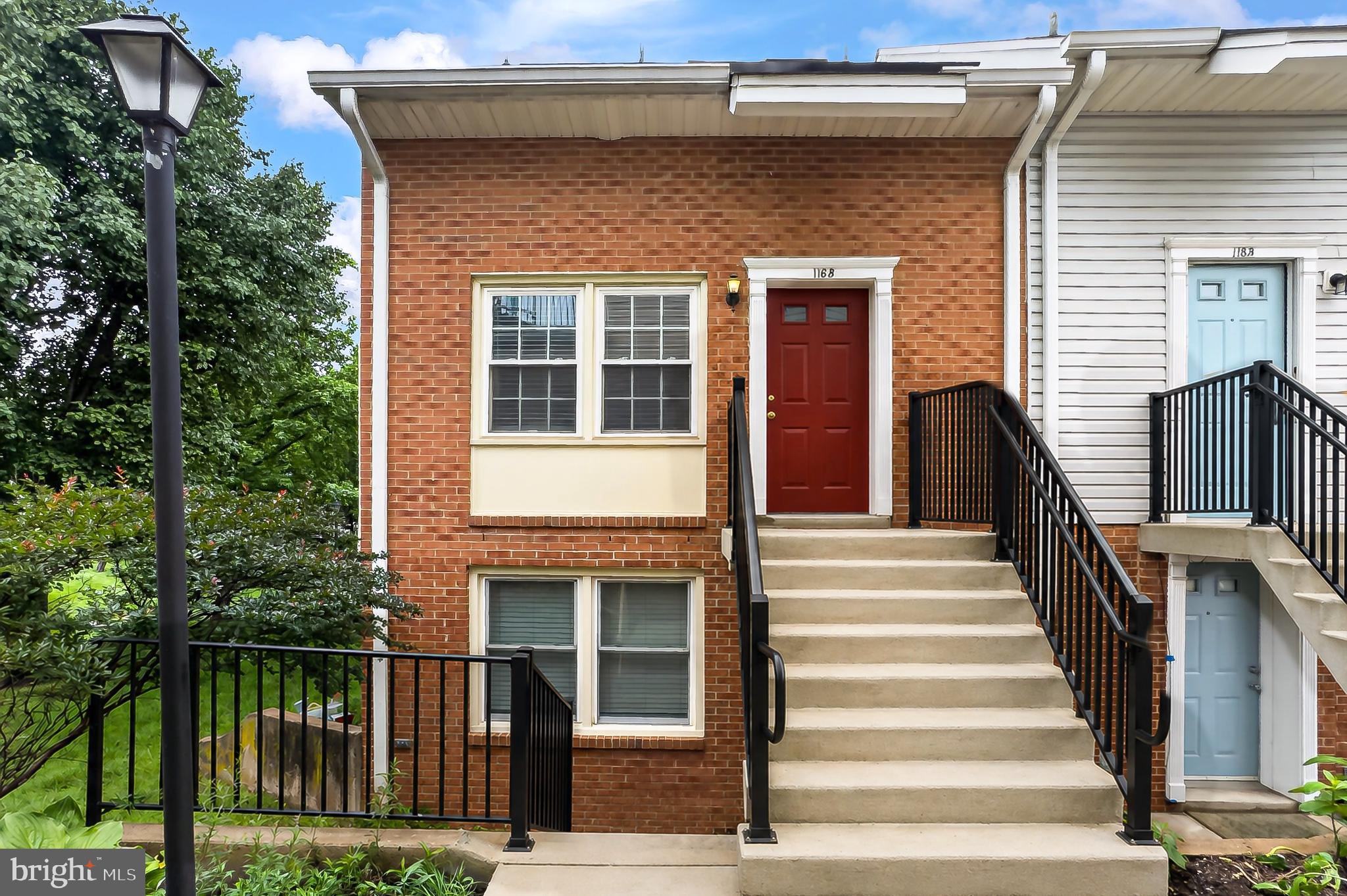 Welcome to this beautifully updated, sun-filled, end-unit condo townhouse nestled in a serene, park-like setting just steps from the bike path. A brand-new concrete stairway leads to the private entrance (NOTE: The temporary wood railings will soon be replaced with wrought iron railings). This home offers a spacious open floor plan with large windows that provide abundant natural light and peaceful green views. The living room flows easily into the updated kitchen with quality cabinetry, granite countertops, stainless steel appliances, and space for an eat-in table. Luxury vinyl plank flooring and freshly painted throughout.  Both bathrooms have been fully renovated with premium finishes, including a deep soaking tub, custom glass shower door, and stylish contemporary details. The expansive primary suite provides vaulted ceilings, a walk-in closet, and a luxurious ensuite bath. Access fabulous storage space through the walk-in closet. Step out onto the private roof deck off the primary bedroom, perfect for outdoor living and surrounded by nature. The newly rebuilt roof deck features maintenance-free premium Trex decking.  Unbeatable location! Just minutes to Clarendon, the Pentagon, Fort Myer, Washington DC, the airport, Trader Joe's, Whole Foods, Amazon HQ, restaurants, shopping, night life, and so much more! Easy access to Washington Boulevard, Route 395, and Route 50. A rare opportunity to own a move-in ready home in a peaceful setting with exceptional proximity to everything the area has to offer.