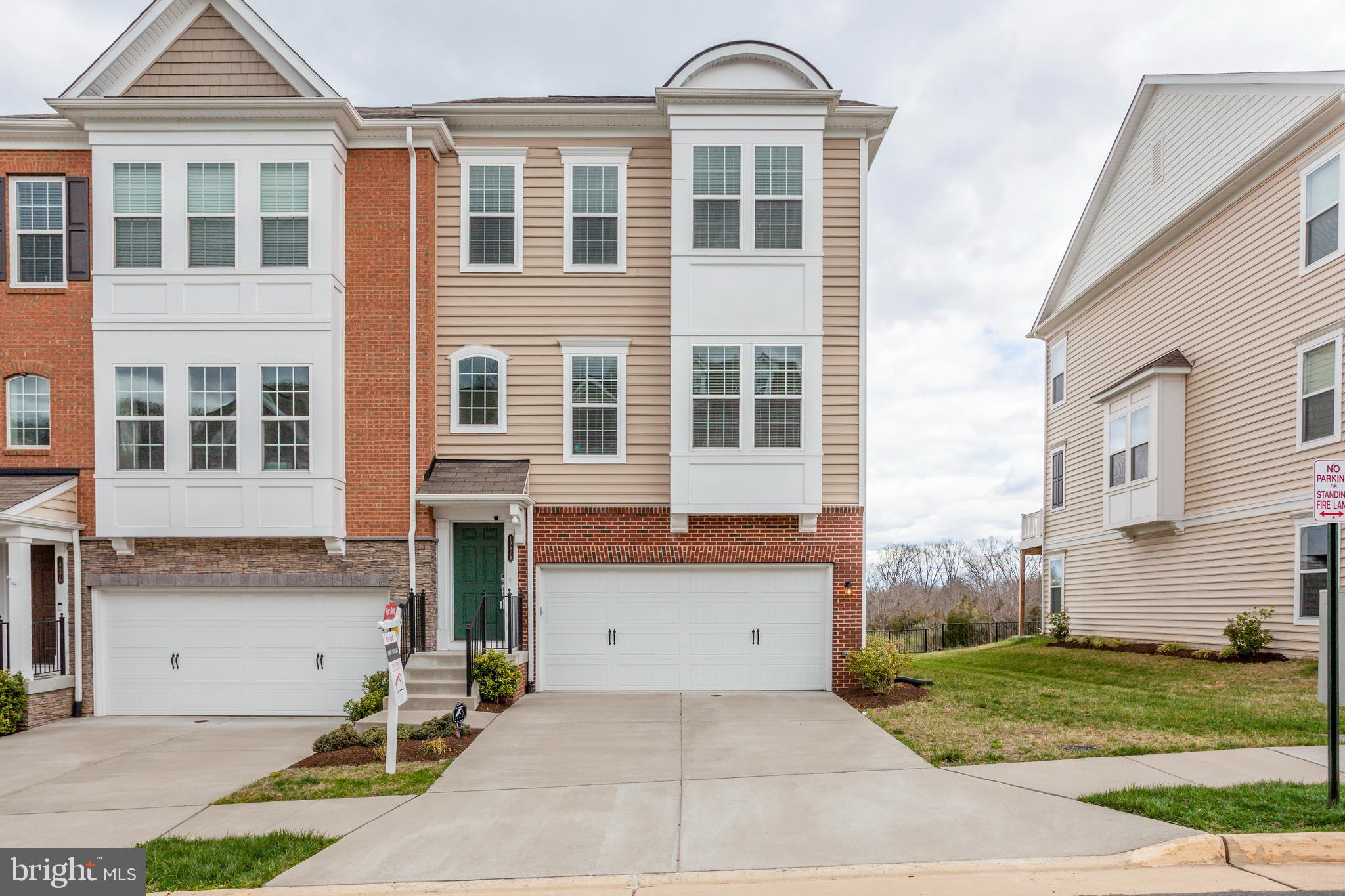 Fantastic 8 years young end unit townhouse in Ashburn!  Huge & open floorplan.  3 Bedrooms upstairs and an additional bedroom/office on lower level.  Open floorplan with extension sunroom.  2 decks!  Dream kitchen.  Large 2 car garage & driveway. Landlord prefers a 2 year lease!   Don't miss out on this fantastic opportunity to live in the heart of Ashburn, very near to One Loudoun, Route 7, shopping, dining and much more.