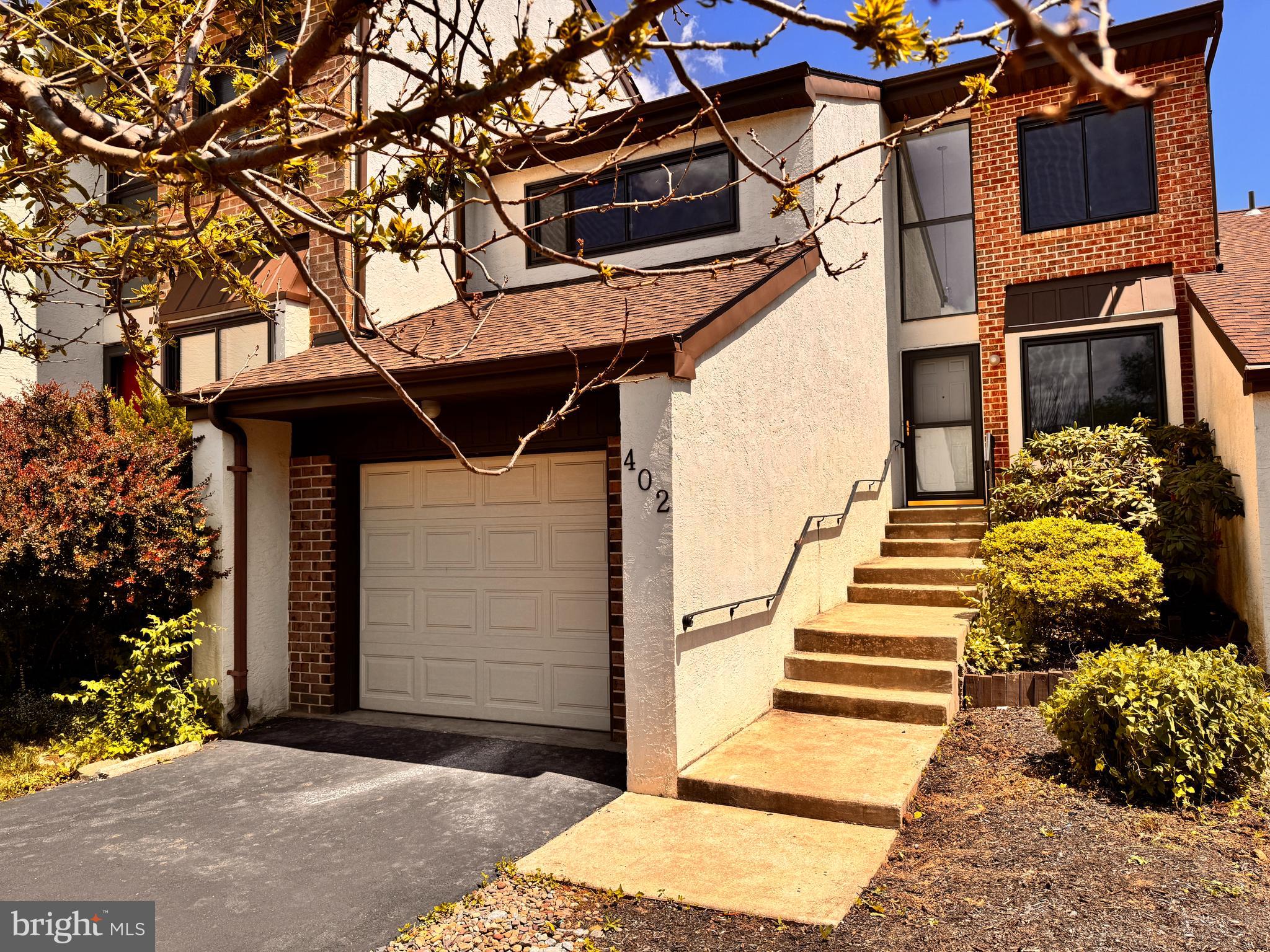 Beautifully updated townhome in Tannerie Woods featuring a modern kitchen with stylish quartz countertops, updated cabinetry, and new appliances. Enjoy a fireplace, private balcony, patio, garage, and new windows installed in 2026 for enhanced energy efficiency and abundant natural light. The spacious layout offers flexible living and entertaining space, while the fireplace adds warmth and charm. Conveniently located in Upper Dublin Township with easy access to Route 309, the Pennsylvania Turnpike, and just minutes from Ambler Borough's shopping, dining, and entertainment. Move-in ready and situated in one of the area's most desirable communities.