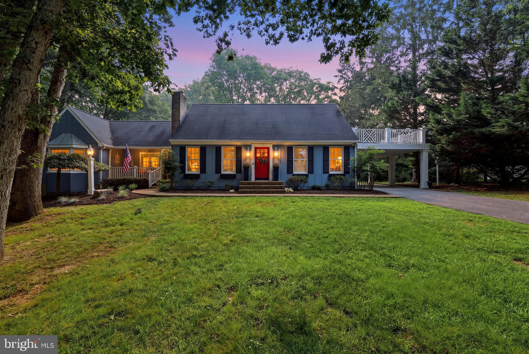 Over 1 acre of a wooded, park-like setting located on the 8th green of the Woodbrier Golf Course! Convenient for commuting, shopping, and medical facilities, this meticulously maintained, custom-built Williamsburg-style Cape Cod is a rare find.

The main level features a primary suite and a secondary bedroom complete with custom built-ins. Beautiful hardwood flooring flows seamlessly from the living room—featuring a gas fireplace with a marble surround—into the dining area, which boasts a built-in buffet. Enjoy your mornings in the quaint, English-style kitchen highlighted by a coffered ceiling and a cozy breakfast nook. The separate family room offers a warm retreat with its own fireplace and vaulted ceilings. To effortlessly bring the outdoors in, the family room opens to a massive deck featuring a pergola and a hot tub overlooking the manicured rear yard.

The second level features two large bedrooms and a shared full bath. Downstairs, the finished lower level includes an exercise room, a secondary family room, and ample space to expand—including rough-in plumbing for an additional bathroom. With so many custom features and intricate details to explore, this property is a must-see! Note: This property conveys with two lots, with the home situated on Lot 178.