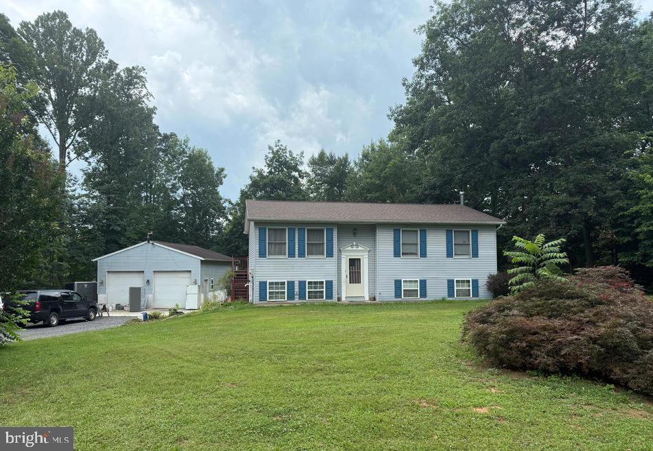 Located in the established Potomac Heights subdivision, 319 Canal Rd sits on nearly an acre (.94 acres) with a fenced backyard—perfect for pets, play, or privacy. This well-maintained 3-bedroom, 2-bath home features a fully finished basement and recent interior updates including hardwood flooring, carpet, and vinyl plank.
A standout feature is the 32x24 detached garage with 12-foot ceilings and a separate electric meter ideal for a workshop, small business, or serious hobbyist.
Serviced by well and septic, with HOA in place, this property offers space, functionality, and easy access to Martinsburg, Hagerstown, and Frederick. Whether you're commuting or just craving more space, this one checks the boxes.