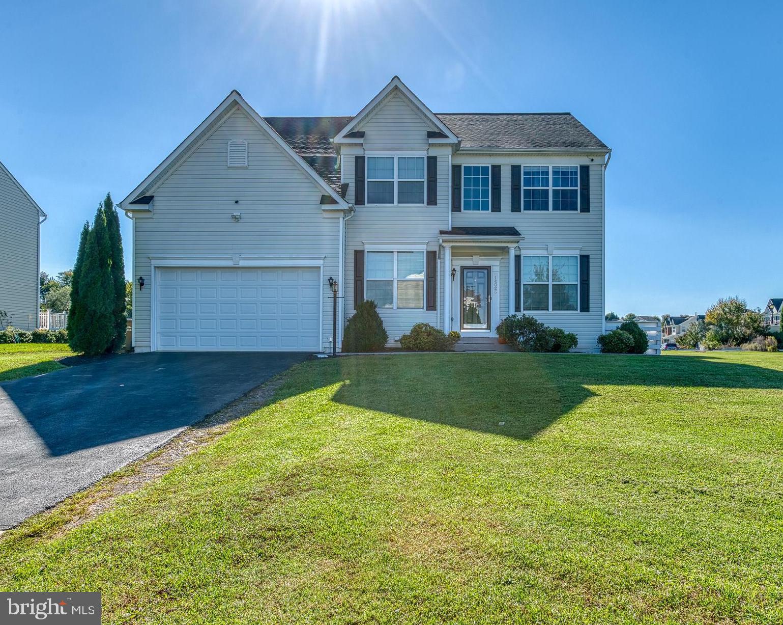 Price Reduction MOTIVATED SELLER ! Sellers are excited to Start their New Construction! Don't miss this stunning 4-bedroom, 3.5-bath Colonial home on a desirable corner lot with a 2-car attached garage!

Step inside to find a formal living room featuring custom barn doors and an office with double doors for added privacy. The bright kitchen boasts upgraded lighting, a separate pantry with a glass door, quartz countertops, and a large island with ample cabinet space and a pots-and-pans hanger. Enjoy cooking with top-of-the-line stainless steel appliances, including a double oven range, microwave, dishwasher, and refrigerator.

Relax in the spacious sunroom, complete with a bar for seating, or unwind on the large covered deck, which features a closet, speakers, and color-changing LED lighting. The backyard is an entertainer’s paradise with a large inground pool and separate deck with covered area for your grills perfect for seating and grilling—all enclosed by a vinyl privacy fence.

A formal dining room off the kitchen adds elegance, while the living room boasts a gas fireplace, coffered ceilings, and built-in speakers. Upstairs, the oversized owner's suite offers a cozy sitting area, two separate walk-in closets, and a luxurious en-suite bath with a stand-up shower, oversized garden tub, and separate sinks. Three additional spacious bedrooms, a hall bathroom, and a convenient hall closet complete the upper level.

The walk-up basement features Pergo flooring throughout, a custom bar with seating for six, a roomy rec room, a versatile additional room with a large closet, and an exercise room with its own closet and a bathroom featuring a rain shower.

The beautifully landscaped exterior includes charming sidewalks leading to the pool area and a custom-built matching shed for extra storage.

This exceptional home won’t last long on the market. Schedule your showing today! Owner is a licensed active Realtor.
